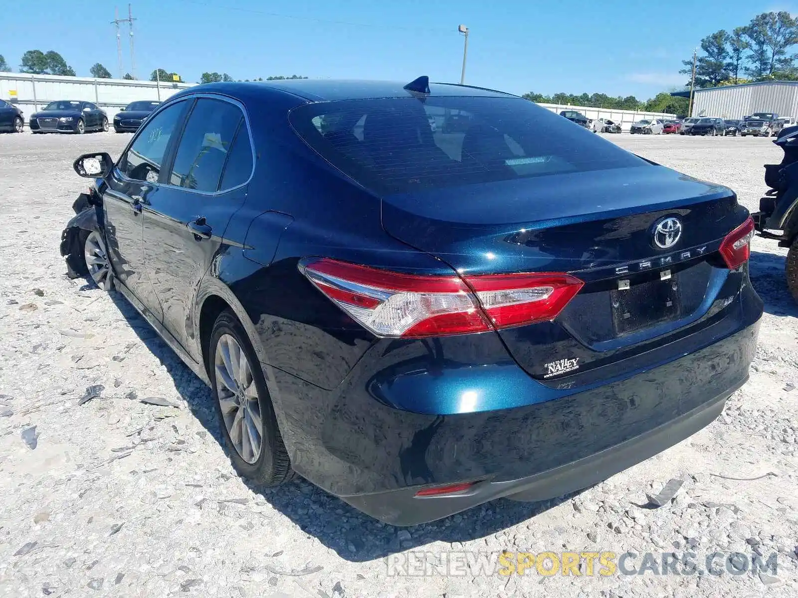 3 Photograph of a damaged car 4T1B11HK1KU699275 TOYOTA CAMRY 2019