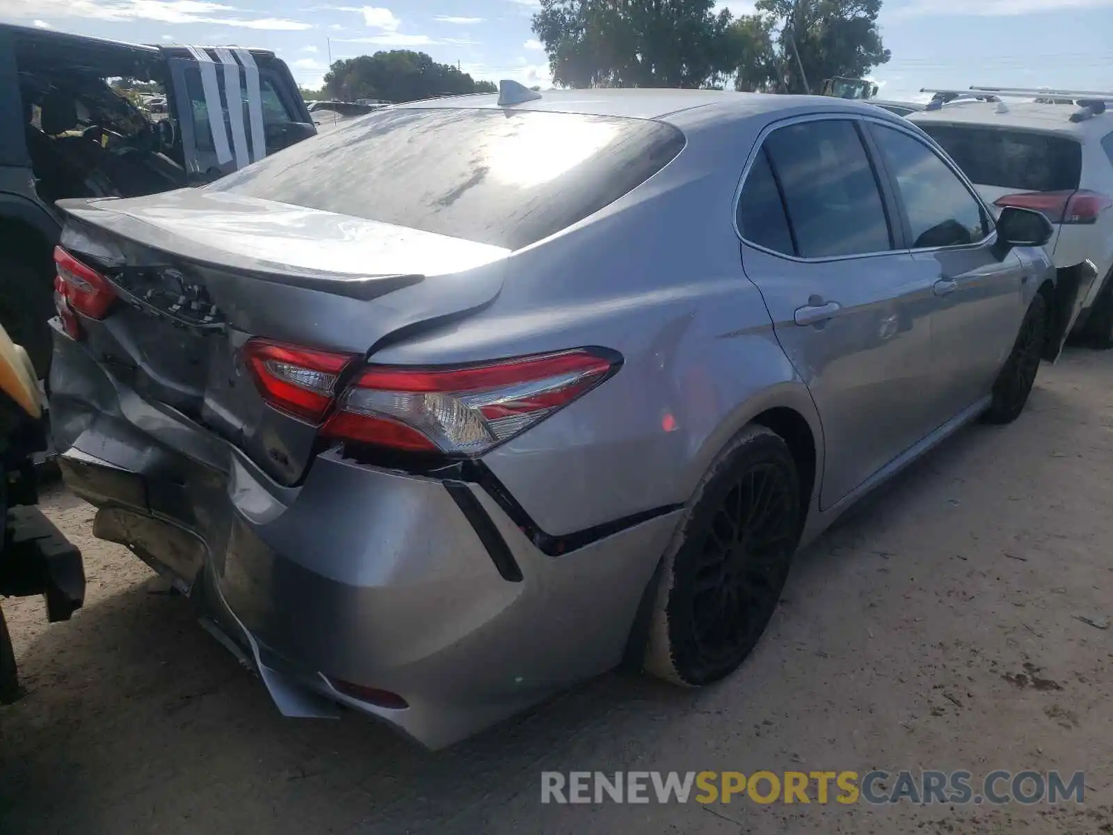 4 Photograph of a damaged car 4T1B11HK1KU700036 TOYOTA CAMRY 2019