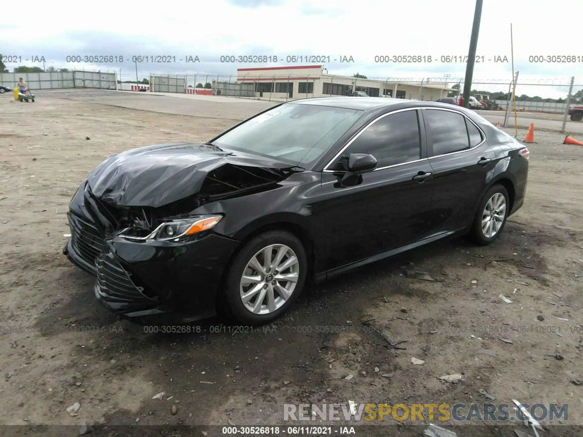 2 Photograph of a damaged car 4T1B11HK1KU700800 TOYOTA CAMRY 2019