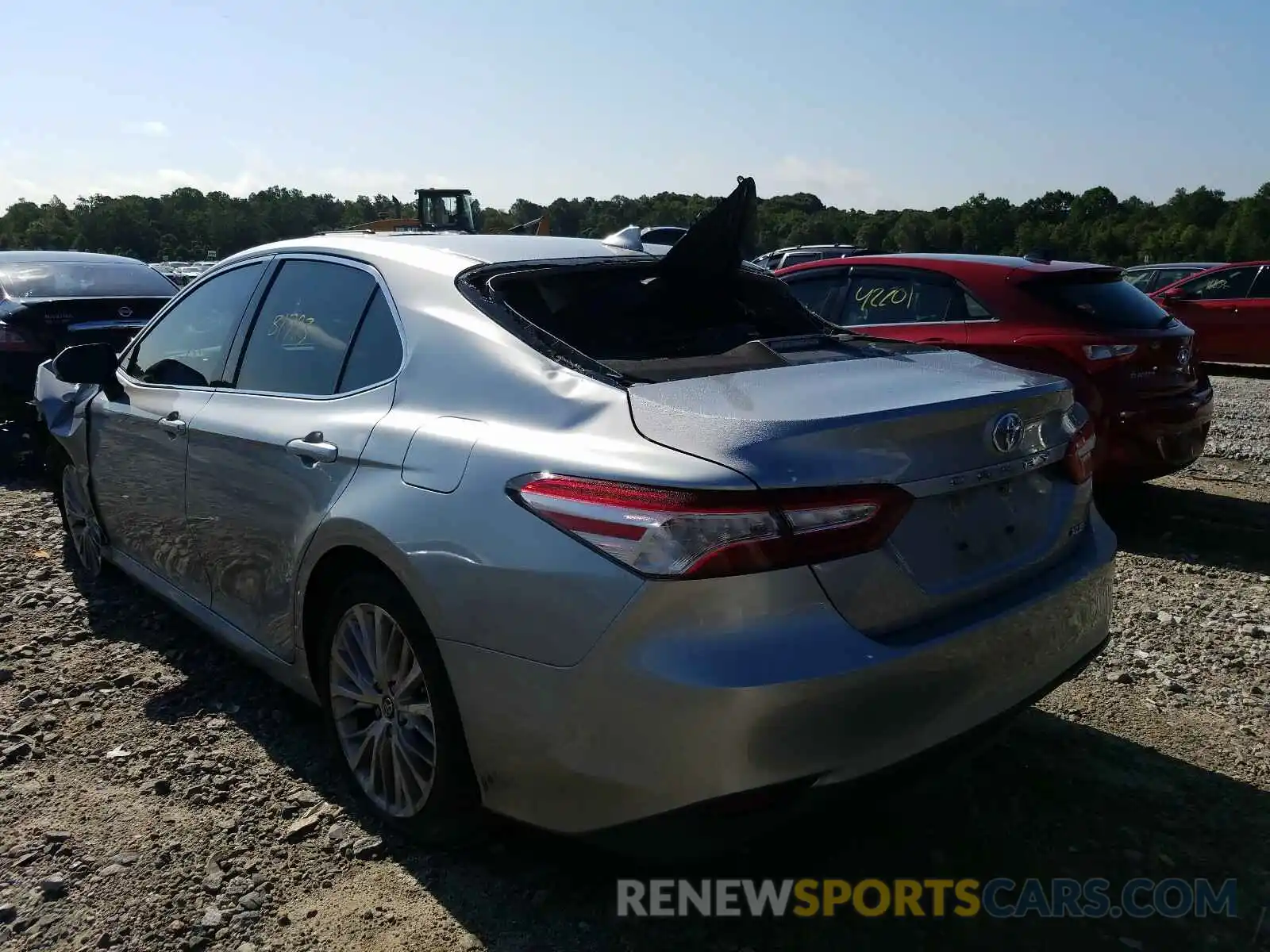 3 Photograph of a damaged car 4T1B11HK1KU701767 TOYOTA CAMRY 2019