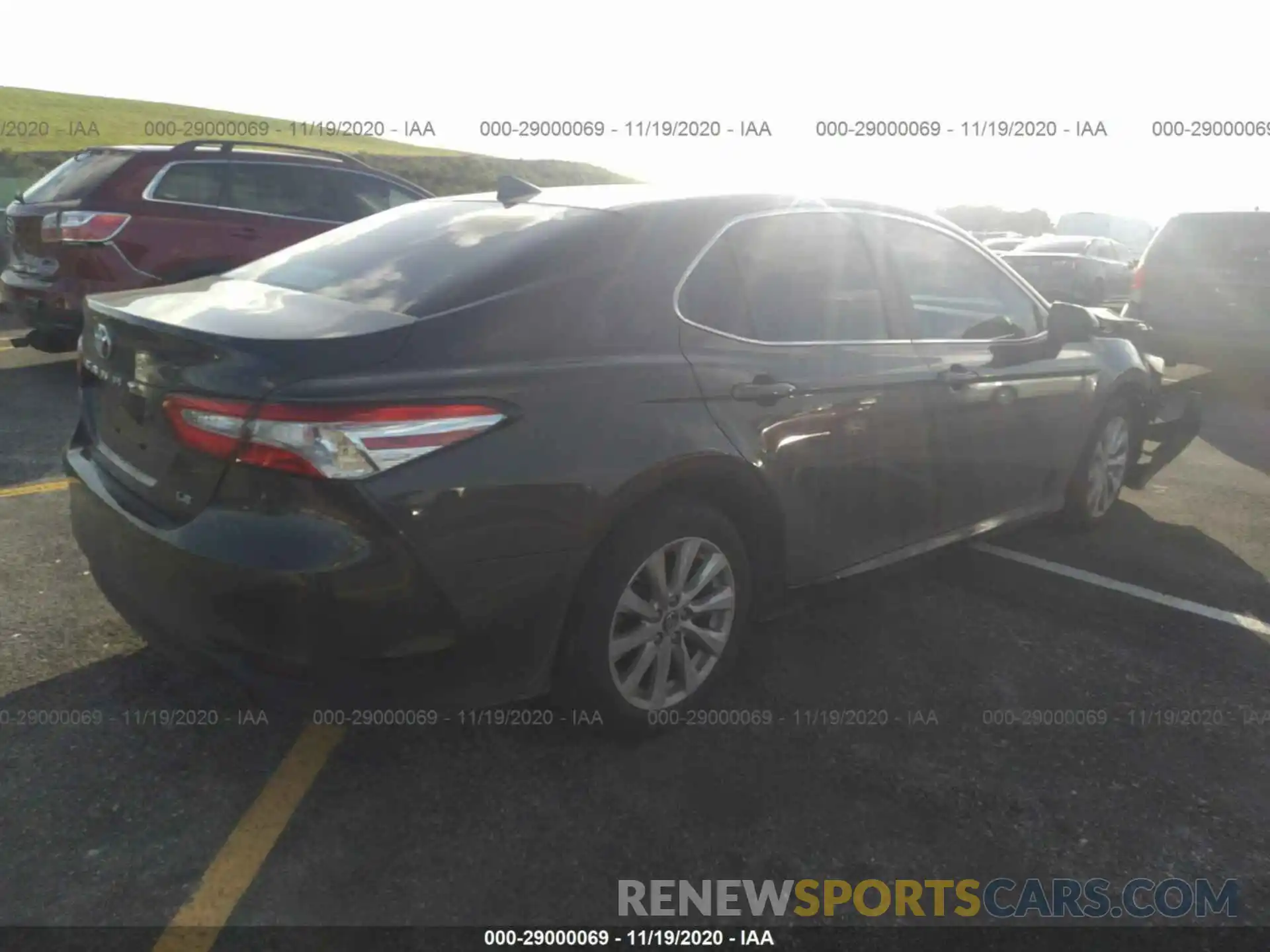 4 Photograph of a damaged car 4T1B11HK1KU702711 TOYOTA CAMRY 2019