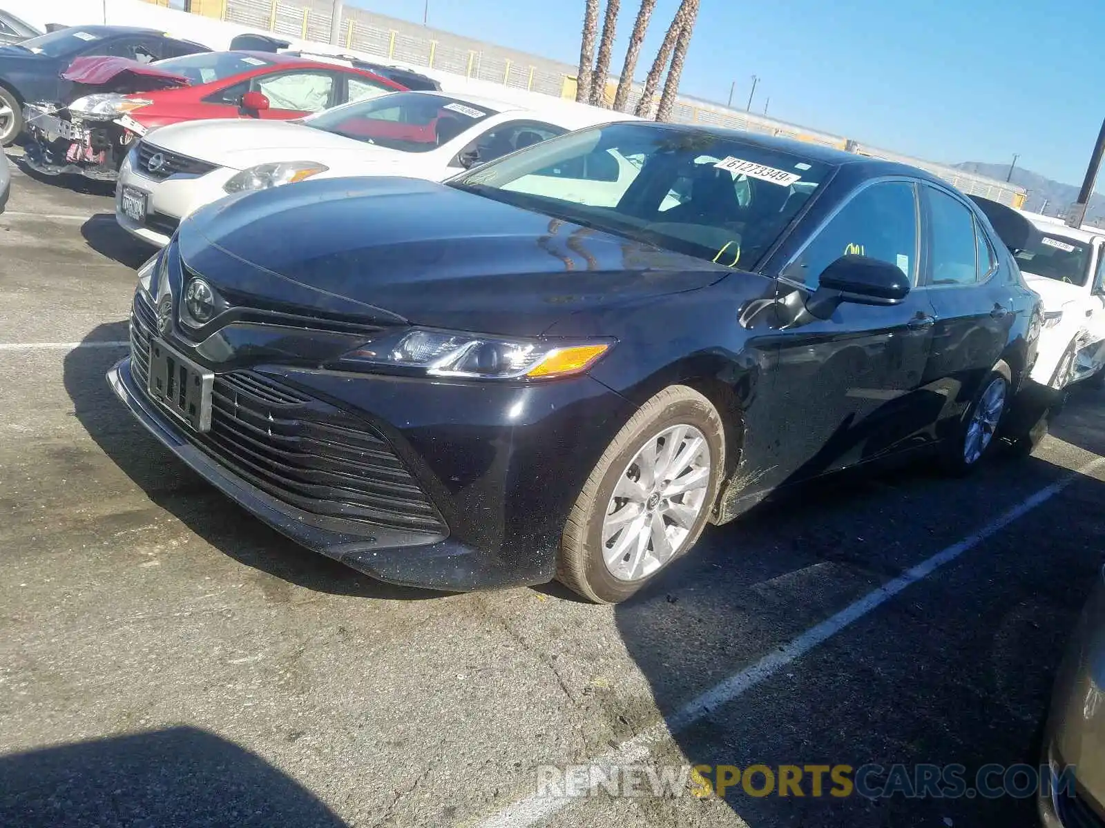 2 Photograph of a damaged car 4T1B11HK1KU703924 TOYOTA CAMRY 2019