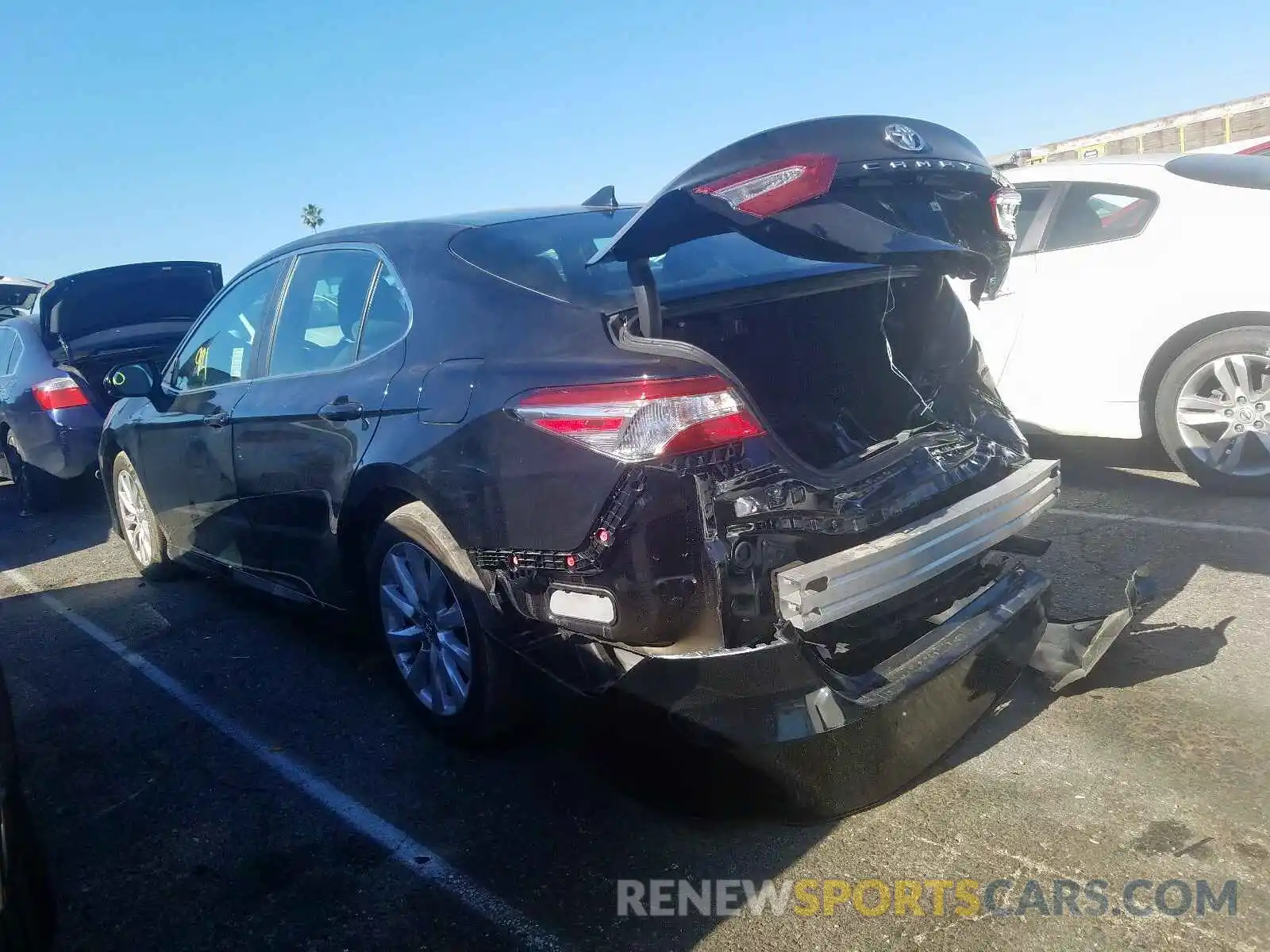 3 Photograph of a damaged car 4T1B11HK1KU703924 TOYOTA CAMRY 2019