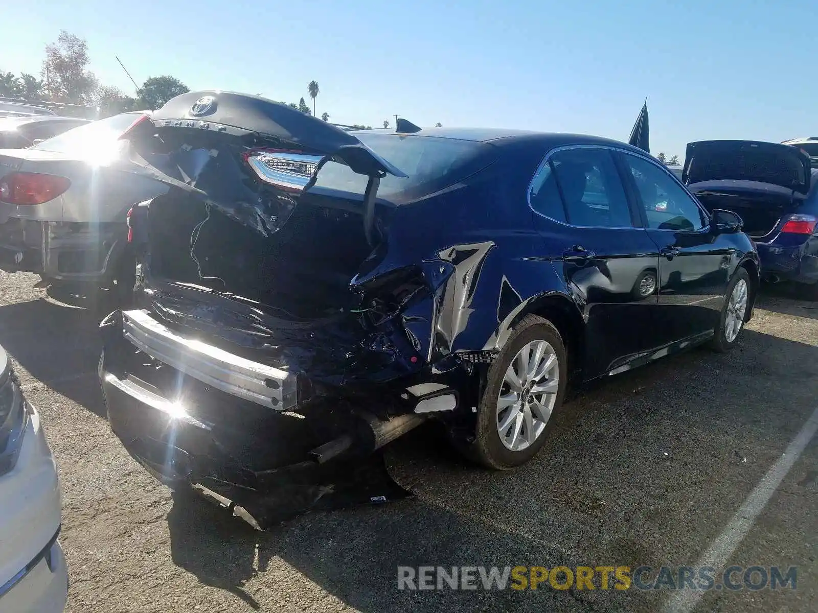 4 Photograph of a damaged car 4T1B11HK1KU703924 TOYOTA CAMRY 2019