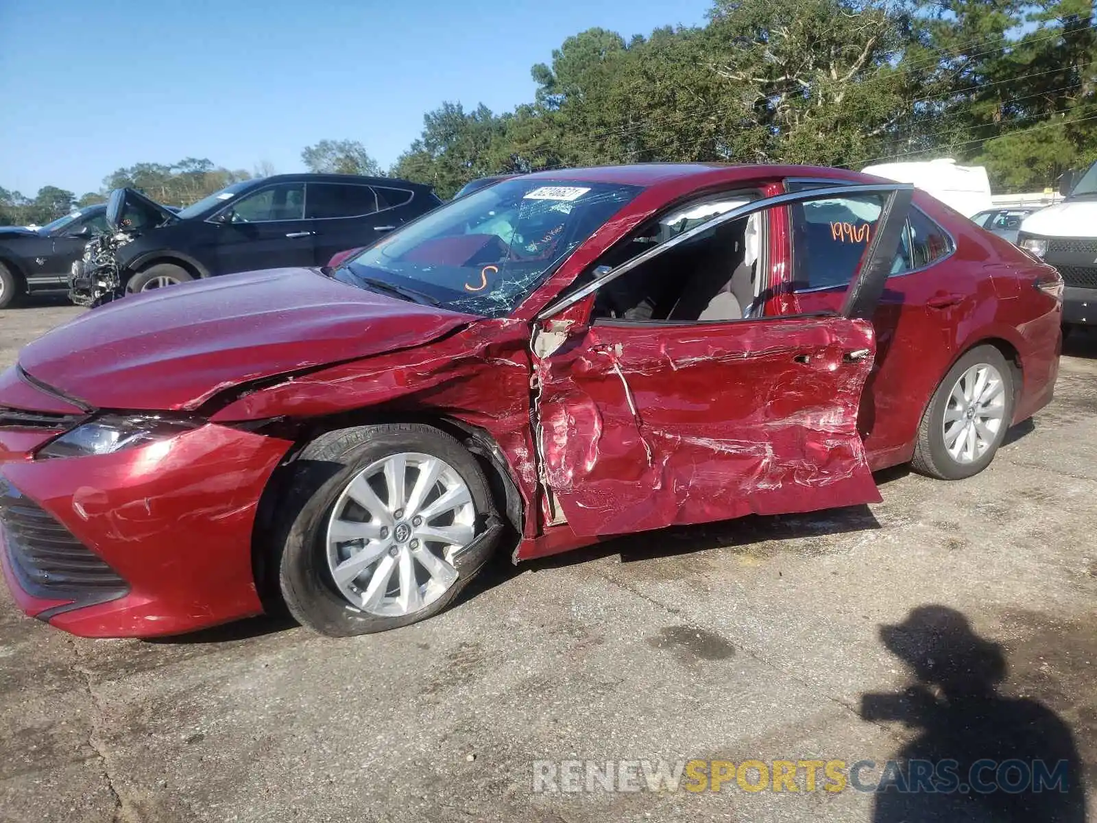 9 Photograph of a damaged car 4T1B11HK1KU704023 TOYOTA CAMRY 2019