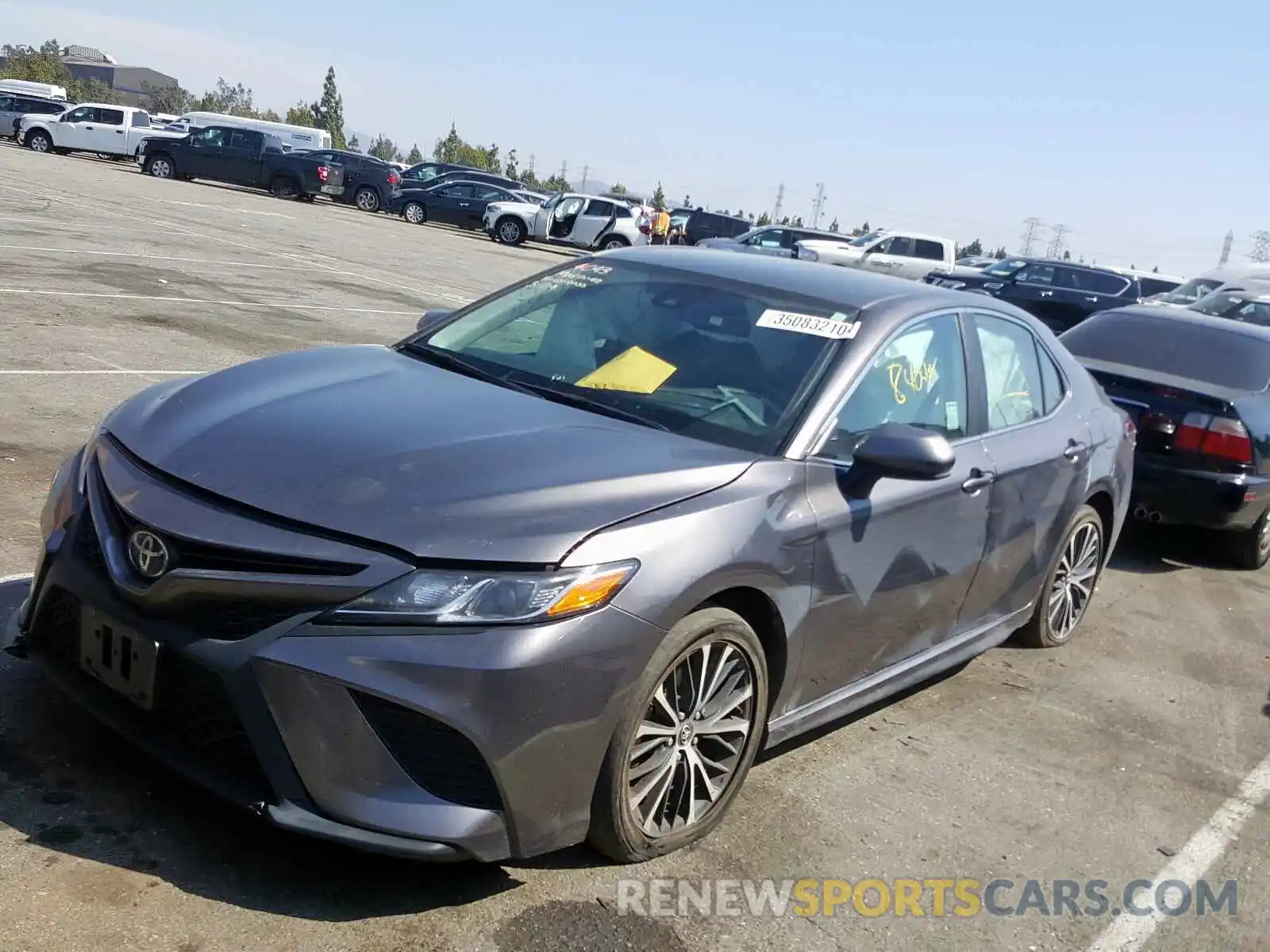 2 Photograph of a damaged car 4T1B11HK1KU704040 TOYOTA CAMRY 2019