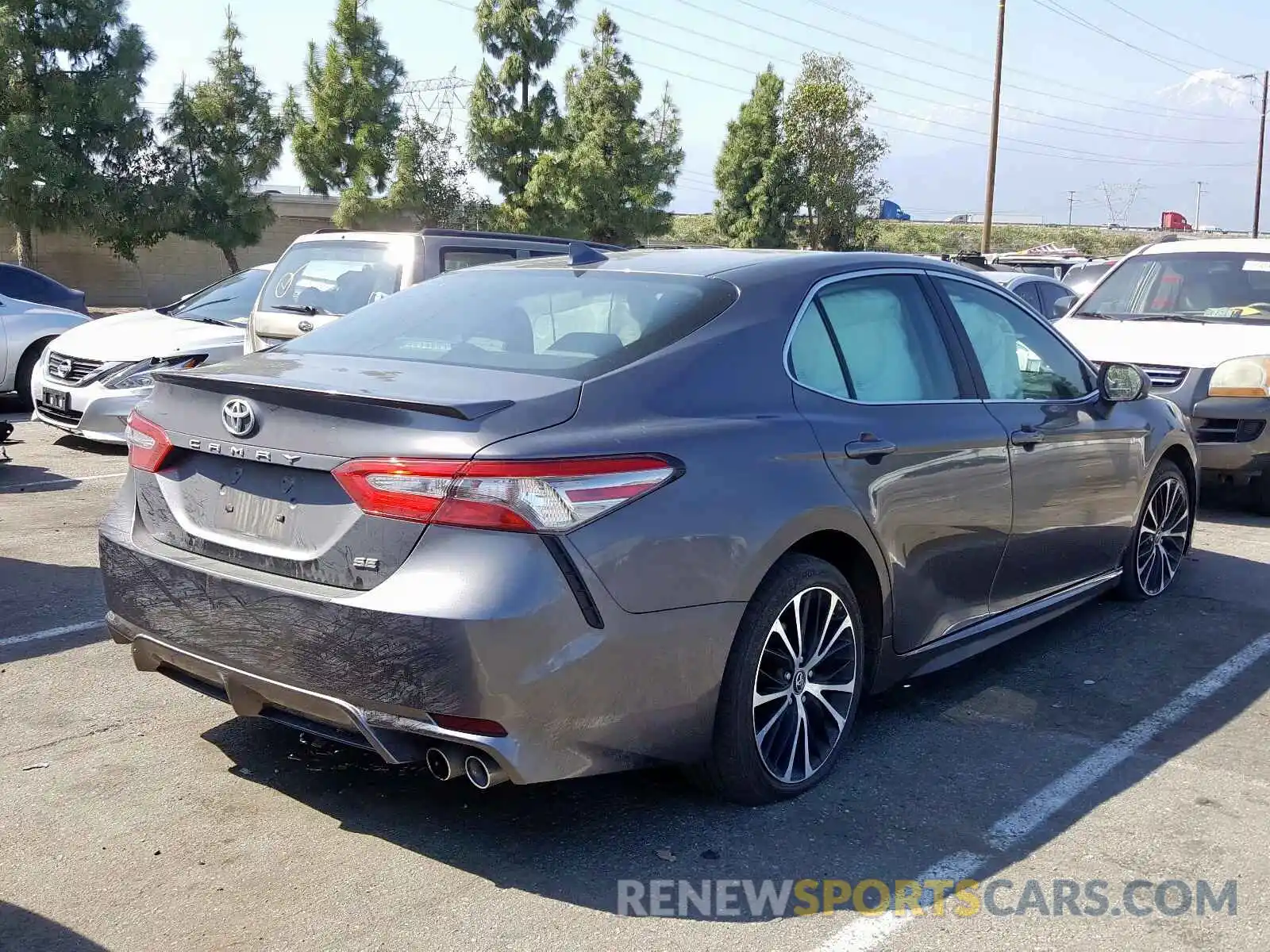 4 Photograph of a damaged car 4T1B11HK1KU704040 TOYOTA CAMRY 2019