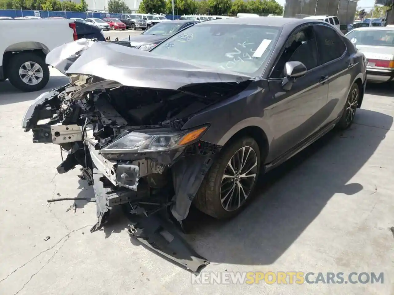 2 Photograph of a damaged car 4T1B11HK1KU704958 TOYOTA CAMRY 2019