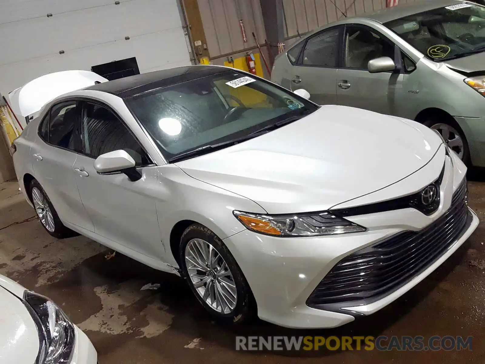 1 Photograph of a damaged car 4T1B11HK1KU706452 TOYOTA CAMRY 2019