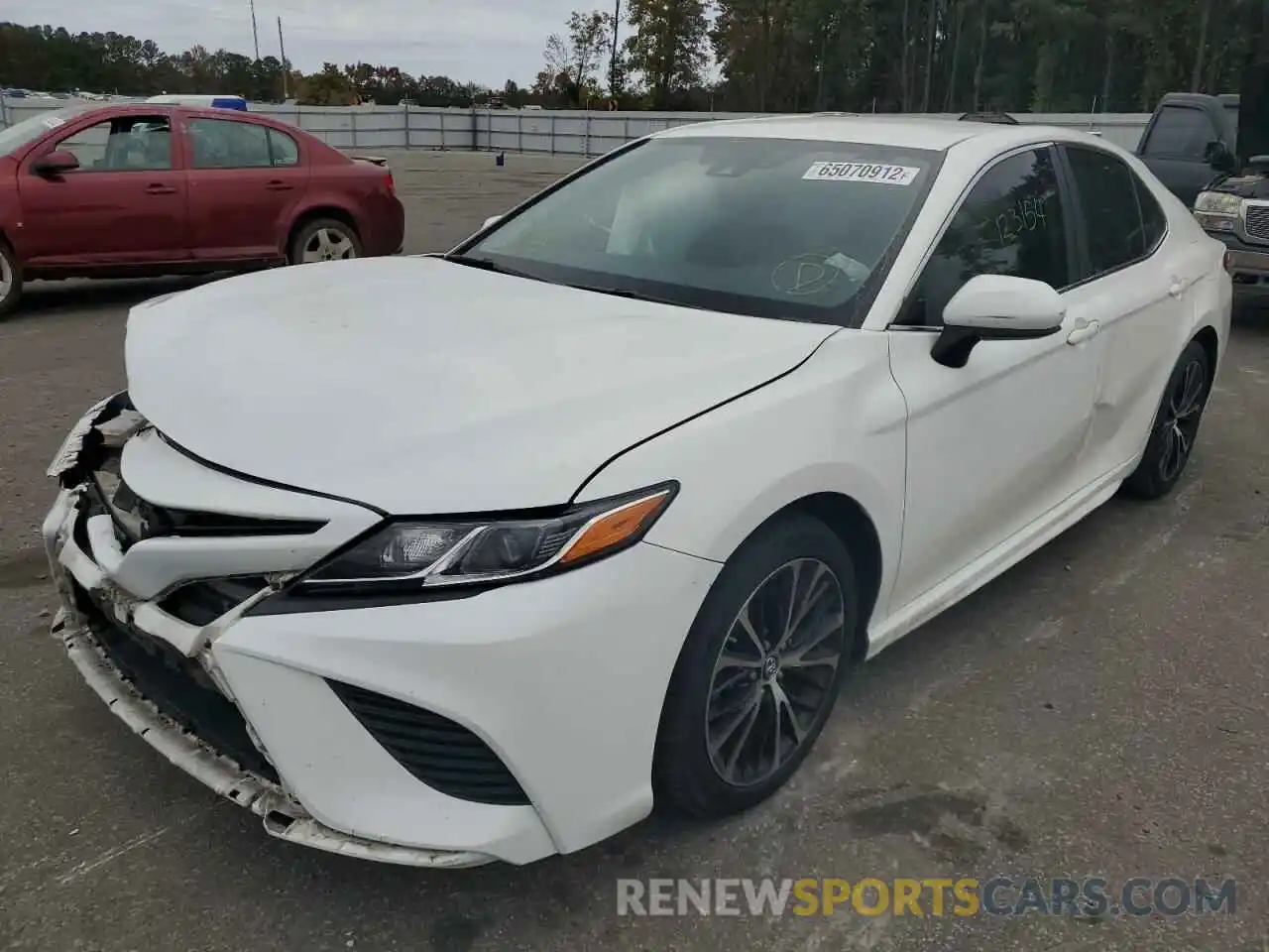 2 Photograph of a damaged car 4T1B11HK1KU706824 TOYOTA CAMRY 2019