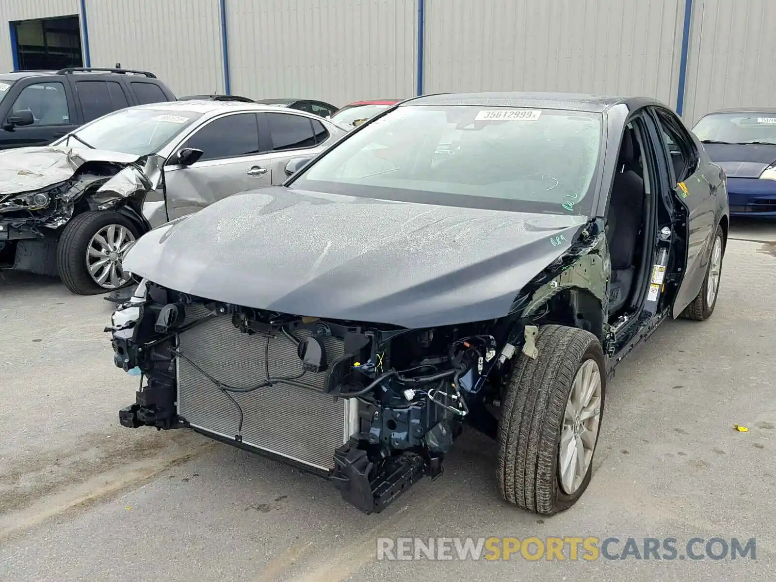 2 Photograph of a damaged car 4T1B11HK1KU707309 TOYOTA CAMRY 2019