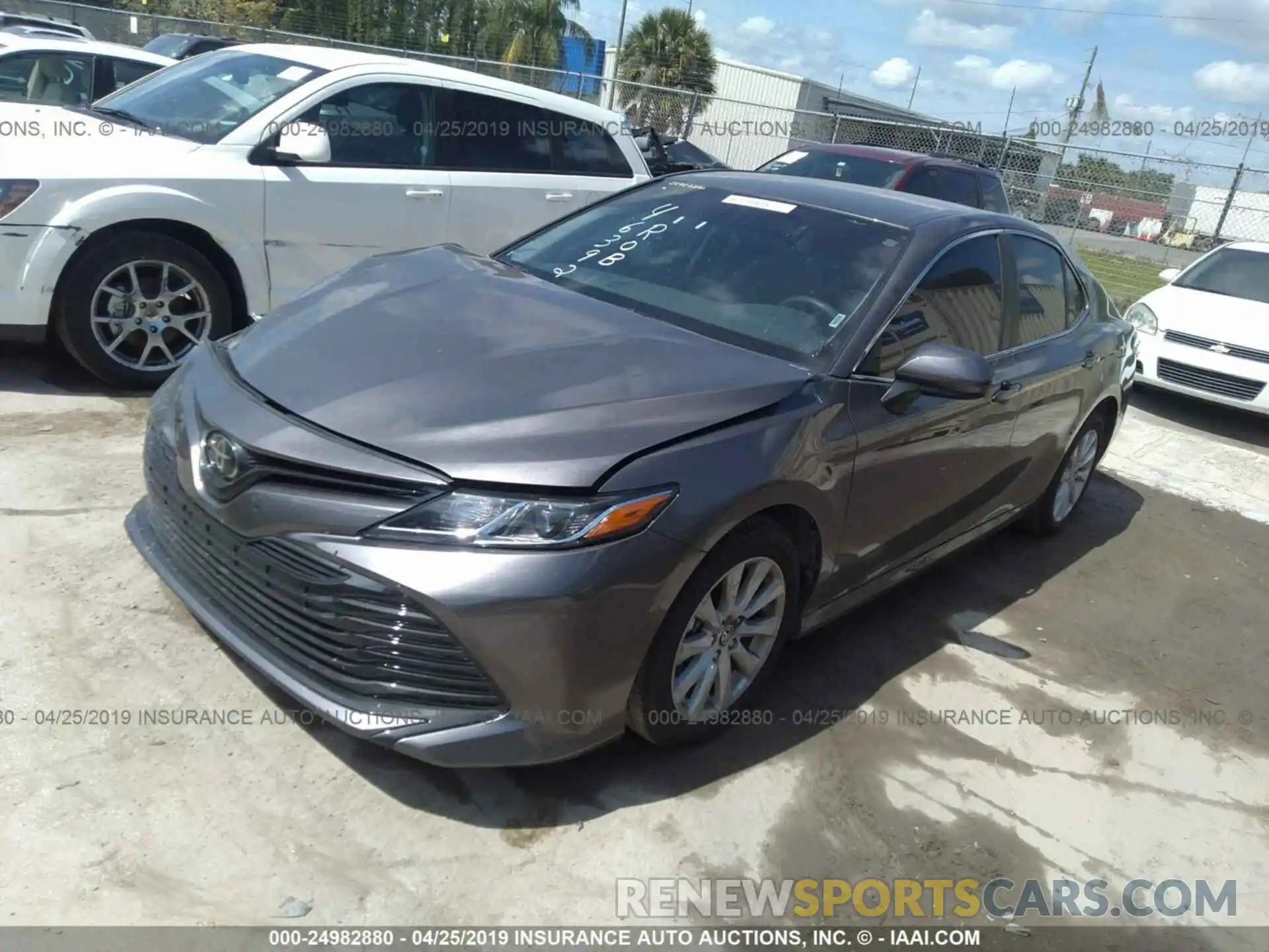 2 Photograph of a damaged car 4T1B11HK1KU707729 TOYOTA CAMRY 2019