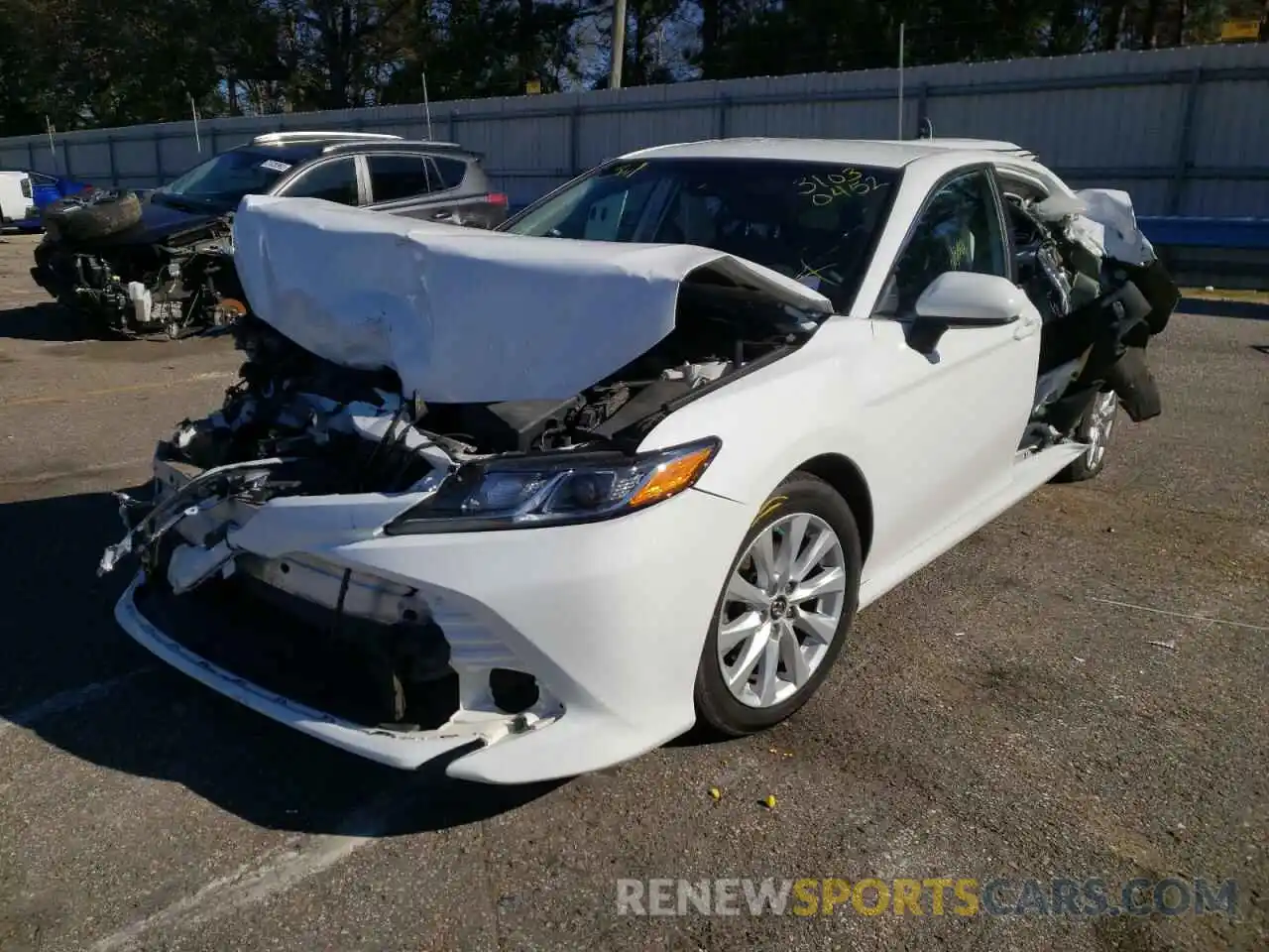 2 Photograph of a damaged car 4T1B11HK1KU708363 TOYOTA CAMRY 2019