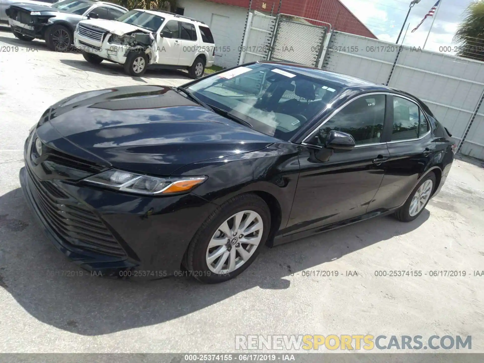 2 Photograph of a damaged car 4T1B11HK1KU708945 TOYOTA CAMRY 2019