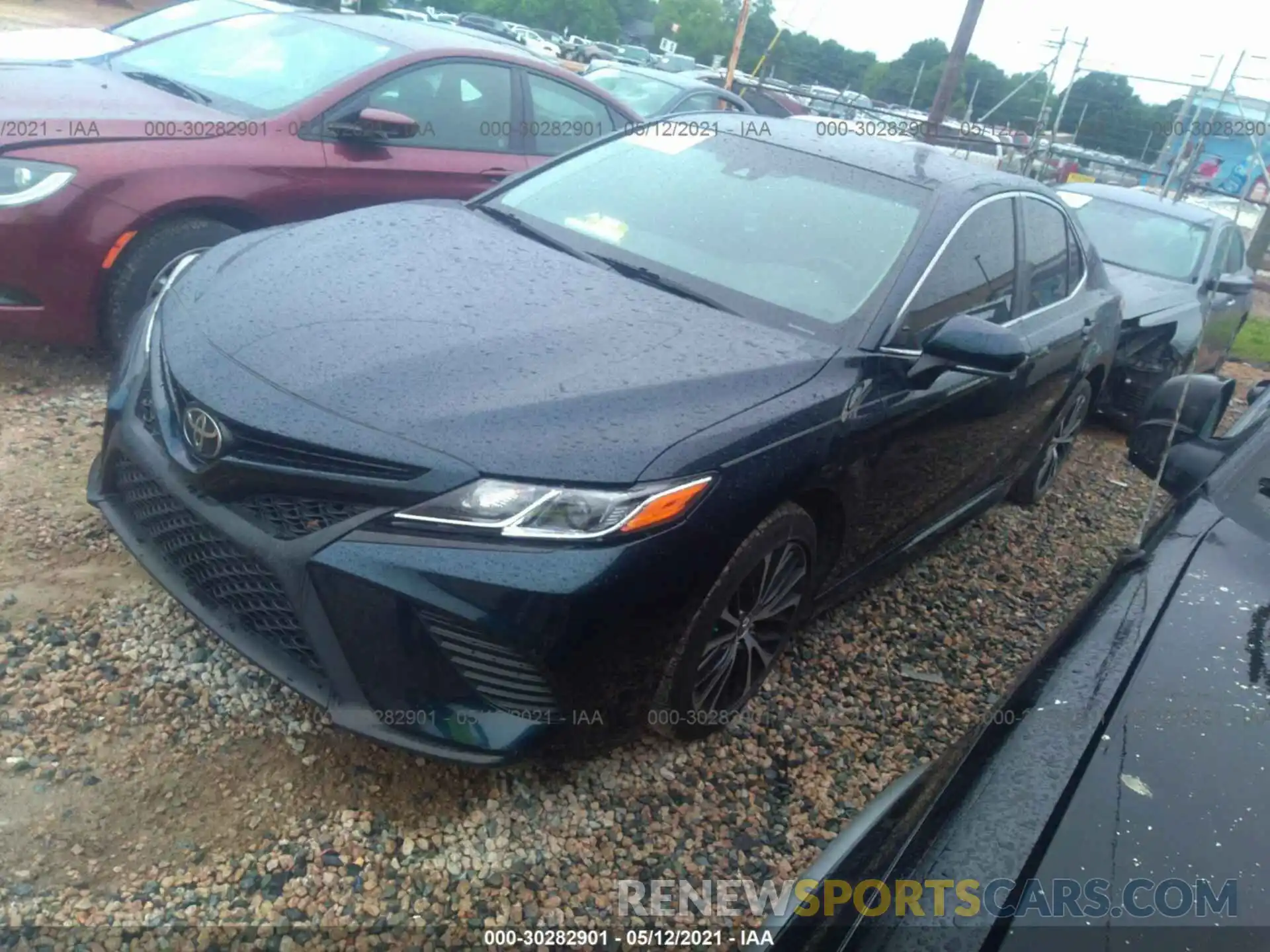 2 Photograph of a damaged car 4T1B11HK1KU710677 TOYOTA CAMRY 2019