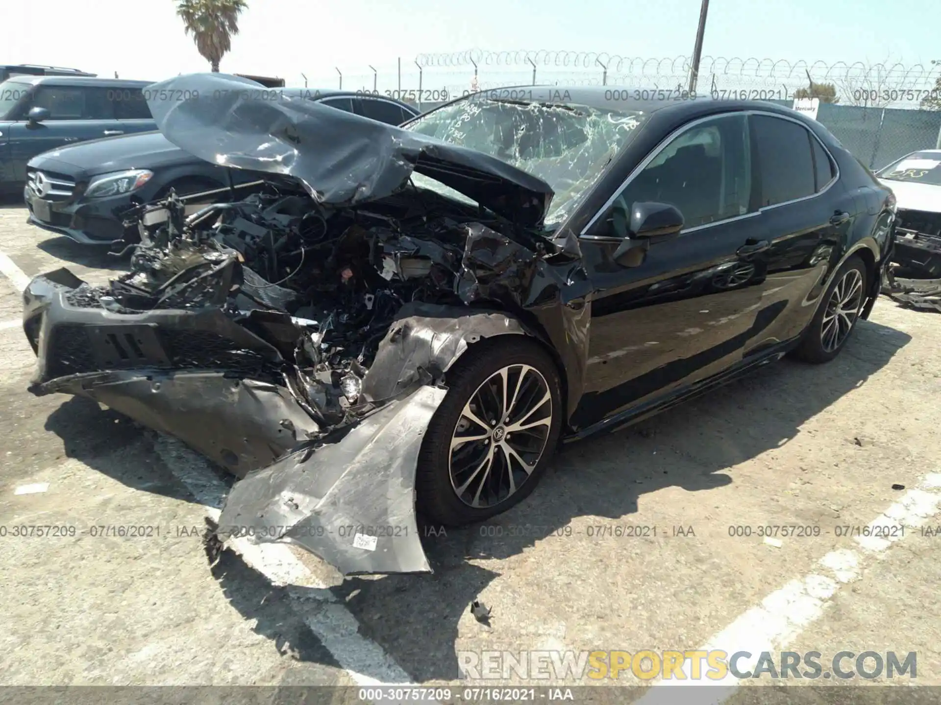 2 Photograph of a damaged car 4T1B11HK1KU710680 TOYOTA CAMRY 2019