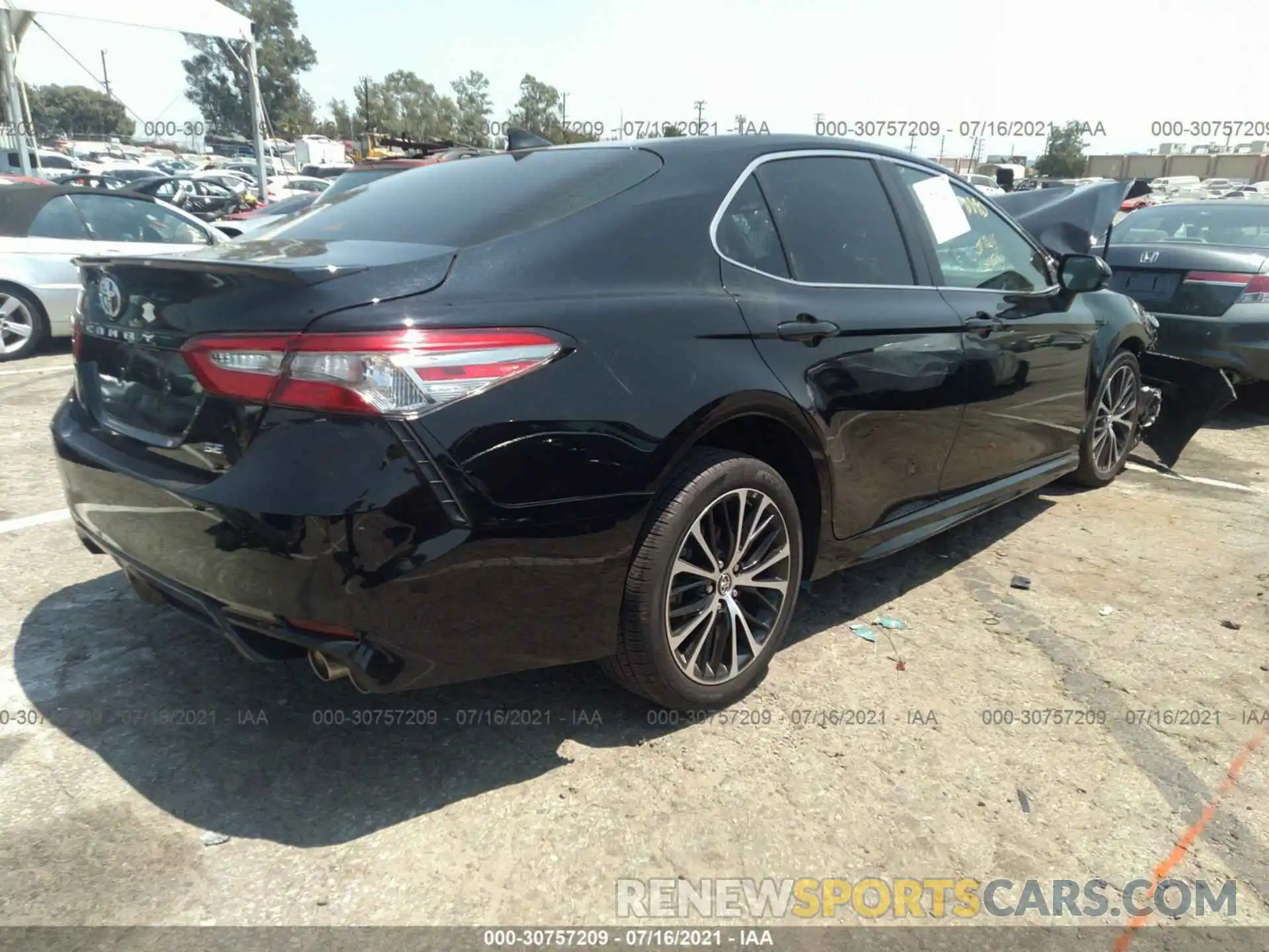 4 Photograph of a damaged car 4T1B11HK1KU710680 TOYOTA CAMRY 2019