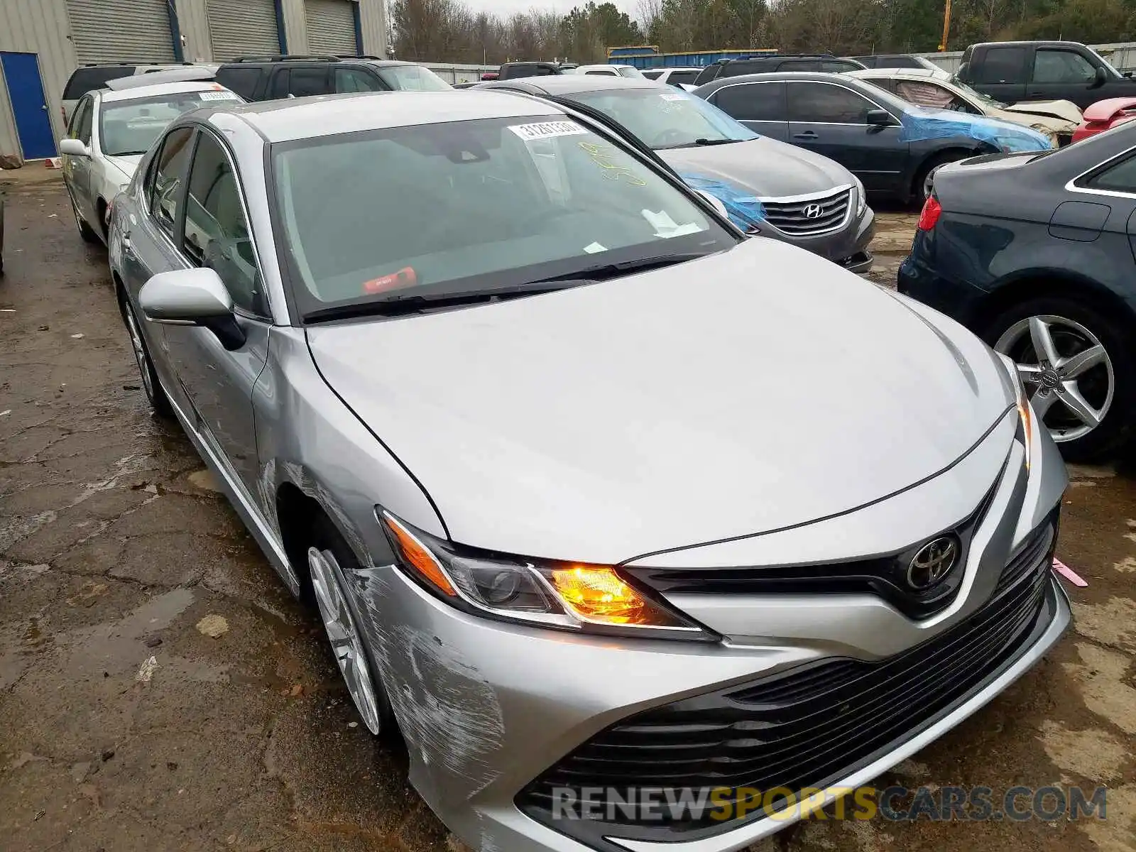 1 Photograph of a damaged car 4T1B11HK1KU713367 TOYOTA CAMRY 2019