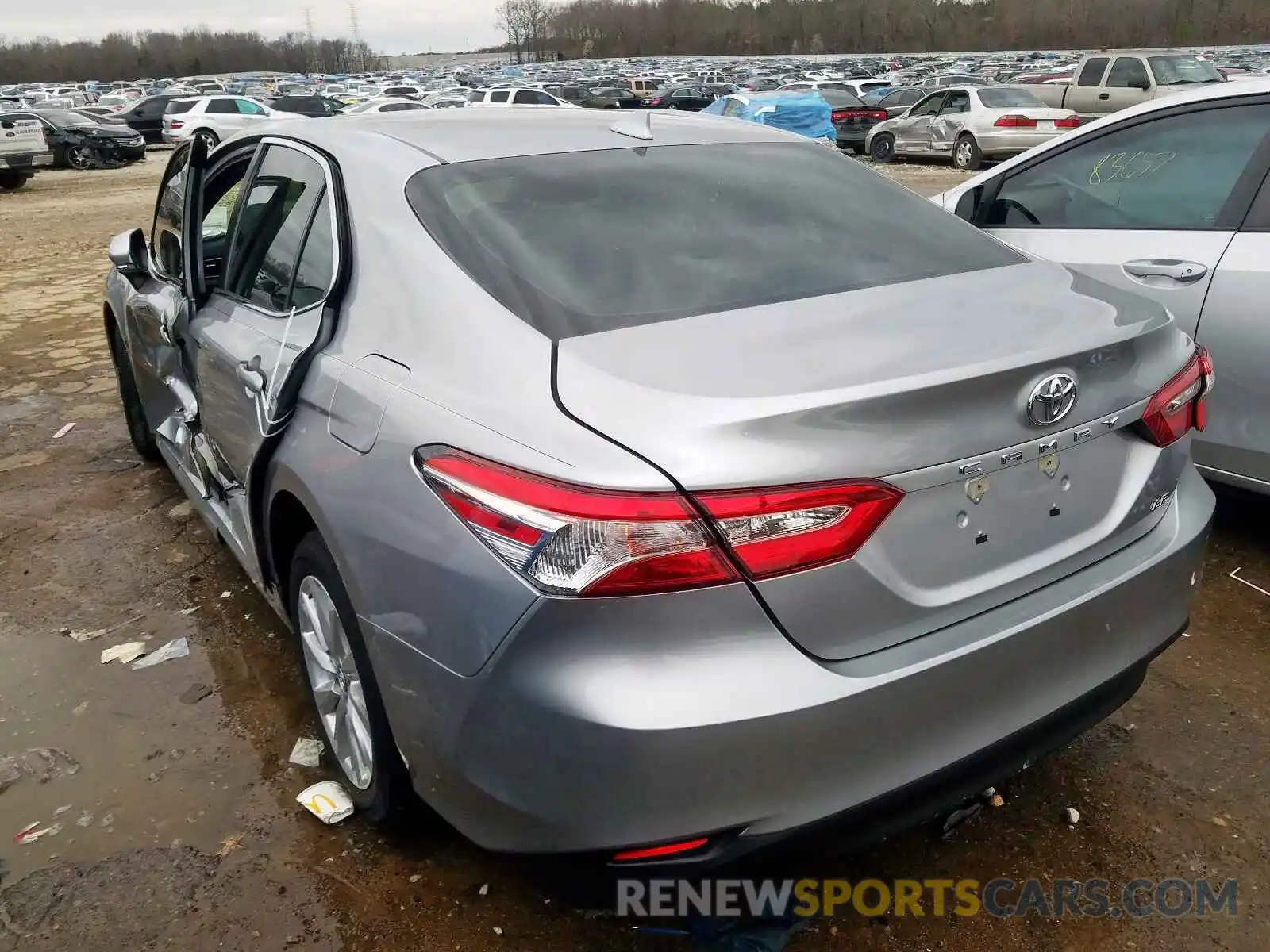 3 Photograph of a damaged car 4T1B11HK1KU713367 TOYOTA CAMRY 2019