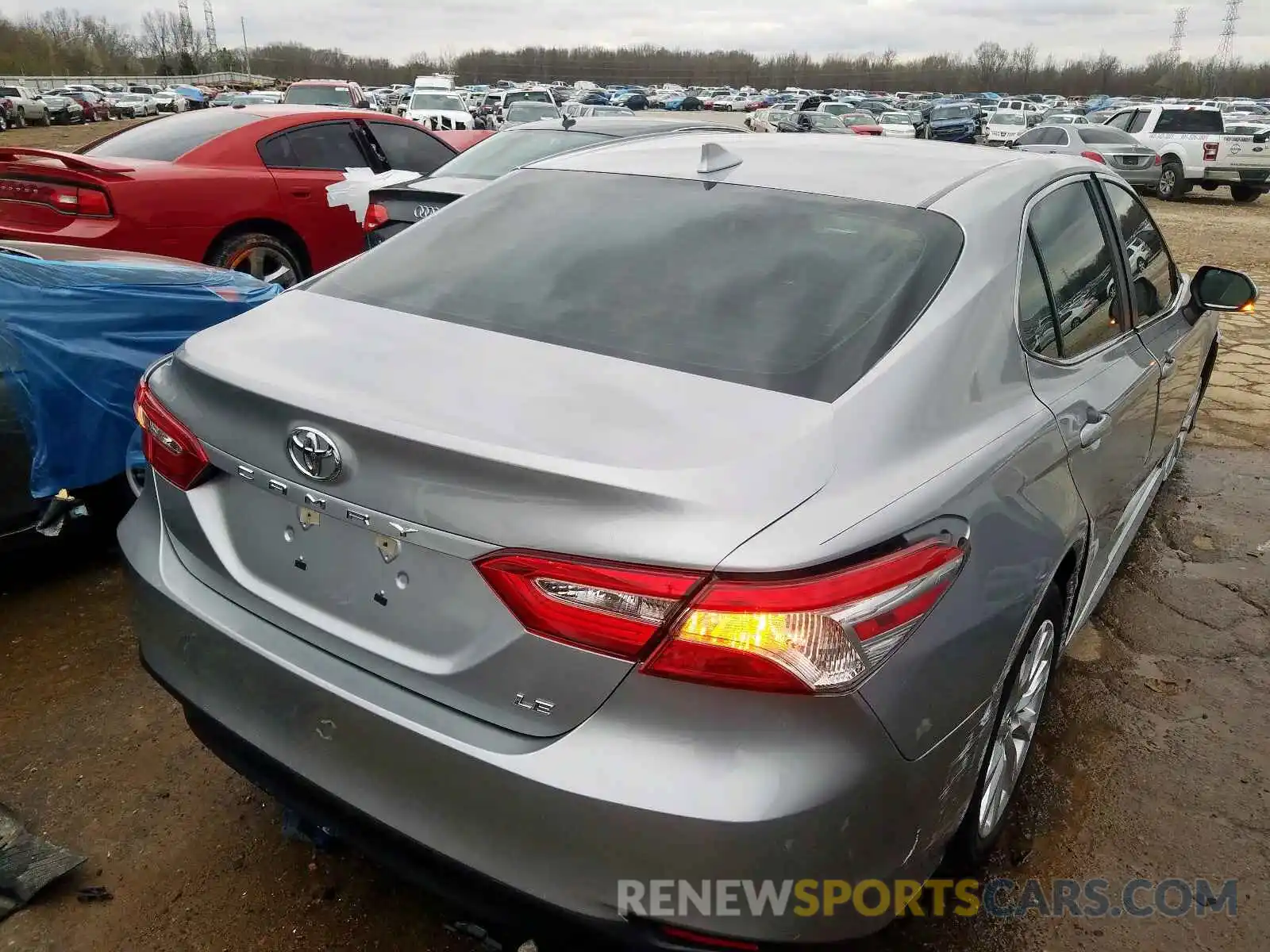 4 Photograph of a damaged car 4T1B11HK1KU713367 TOYOTA CAMRY 2019