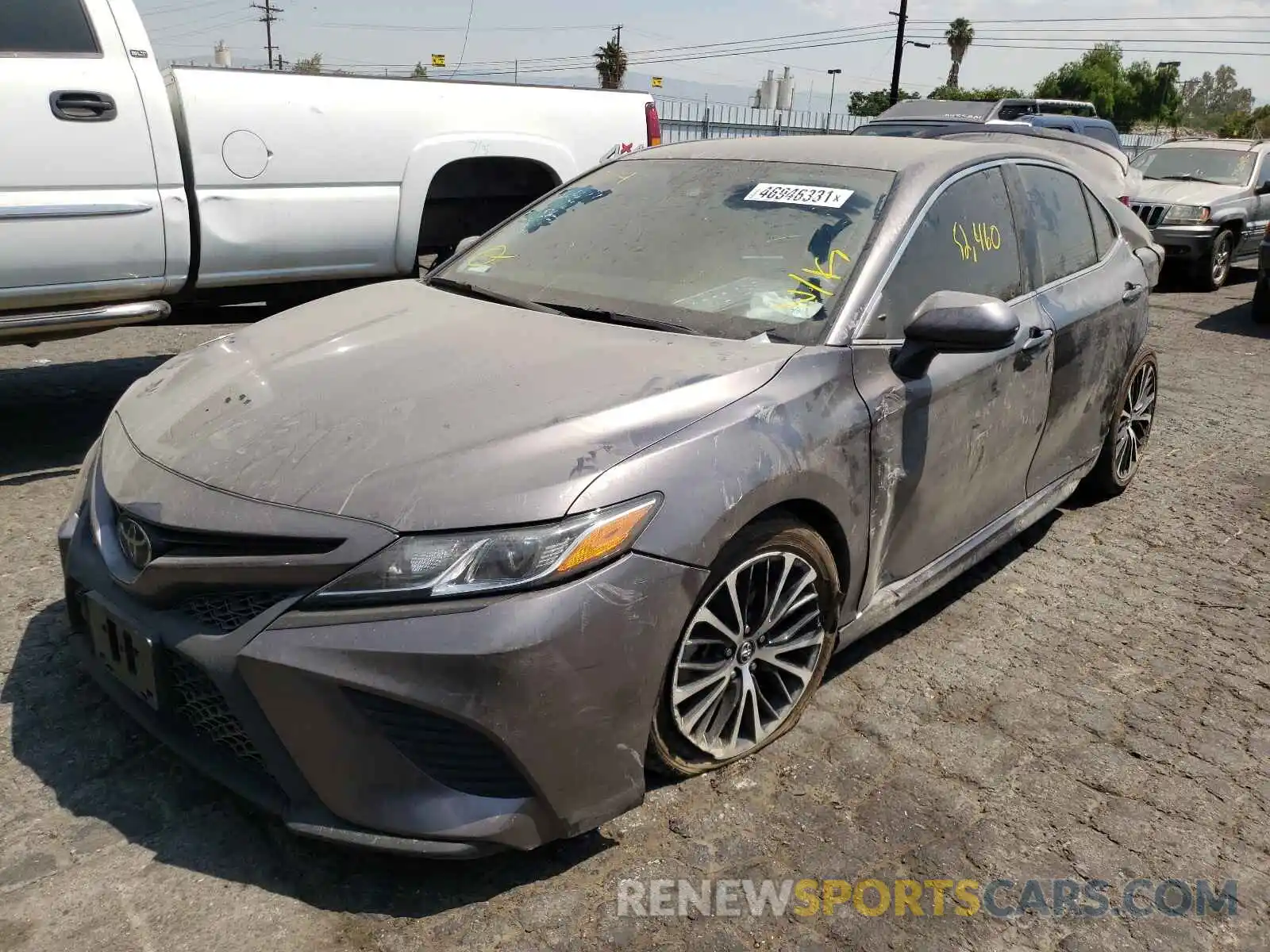 2 Photograph of a damaged car 4T1B11HK1KU713546 TOYOTA CAMRY 2019