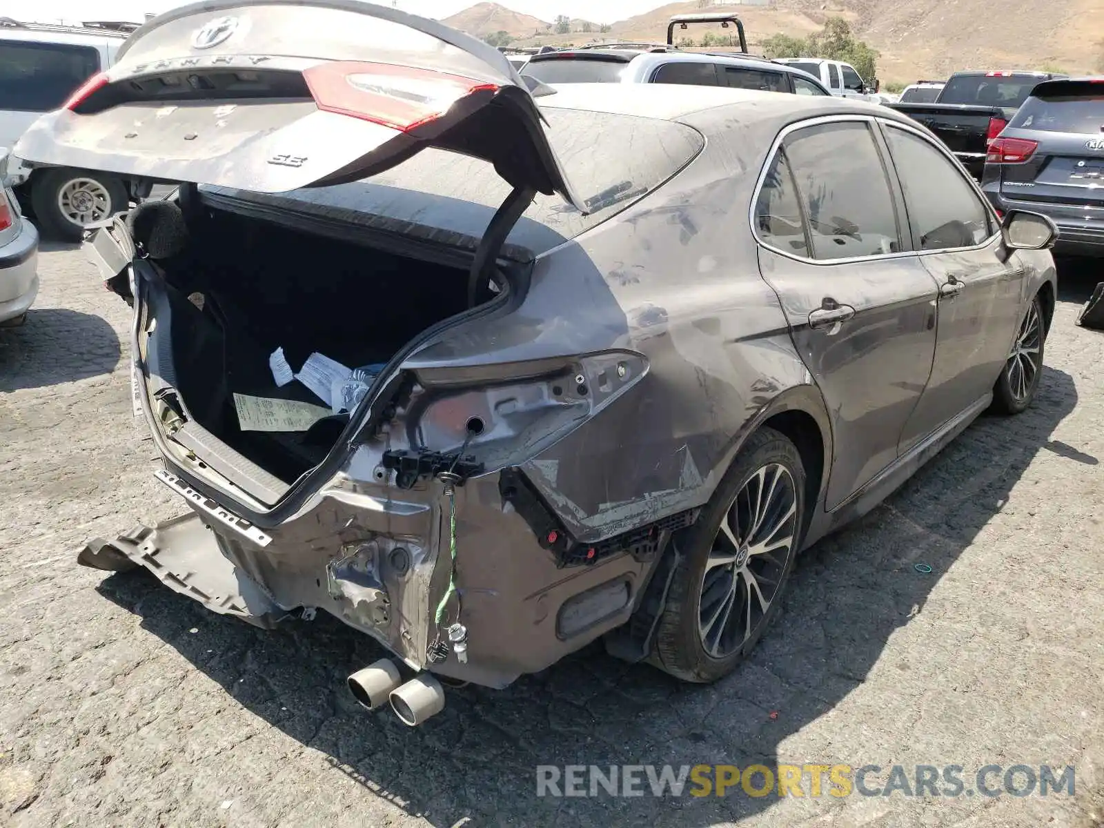 4 Photograph of a damaged car 4T1B11HK1KU713546 TOYOTA CAMRY 2019