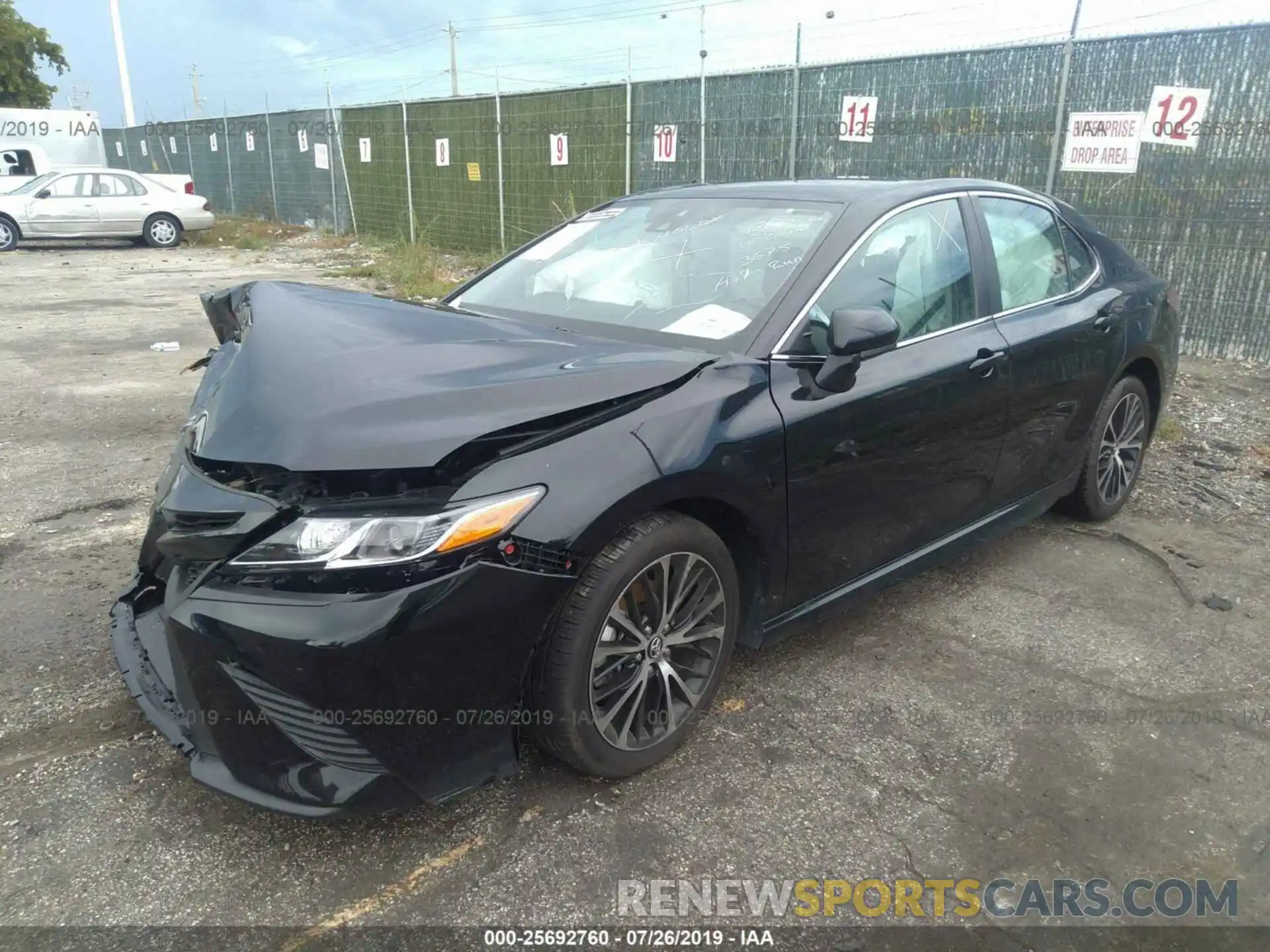 2 Photograph of a damaged car 4T1B11HK1KU713675 TOYOTA CAMRY 2019