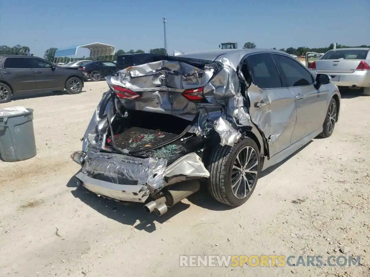 4 Photograph of a damaged car 4T1B11HK1KU714292 TOYOTA CAMRY 2019