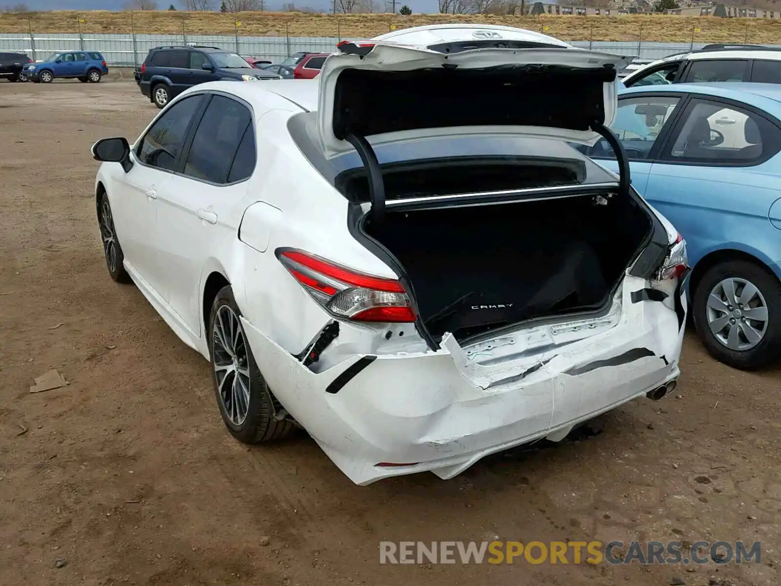 3 Photograph of a damaged car 4T1B11HK1KU714518 TOYOTA CAMRY 2019