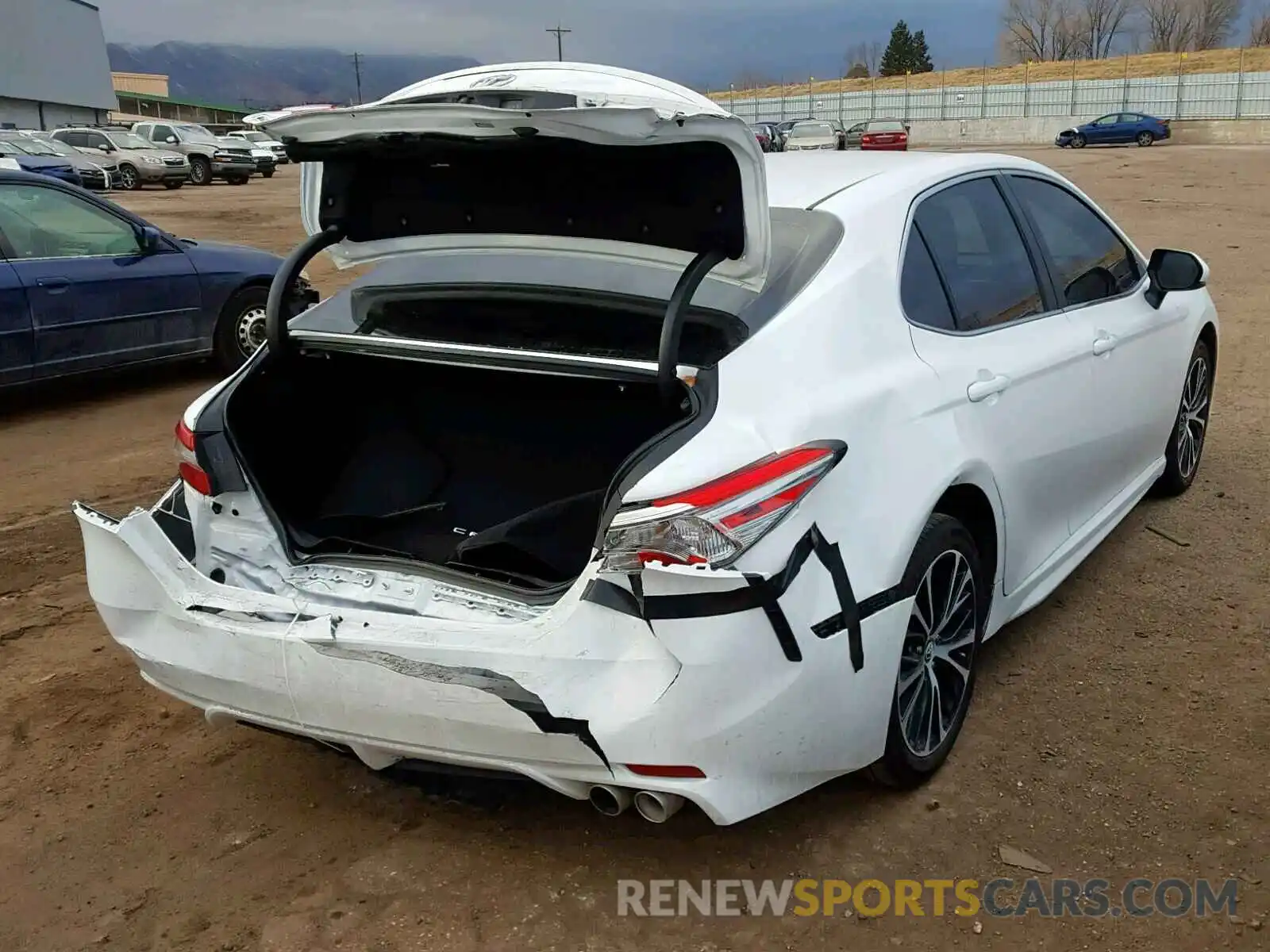 4 Photograph of a damaged car 4T1B11HK1KU714518 TOYOTA CAMRY 2019