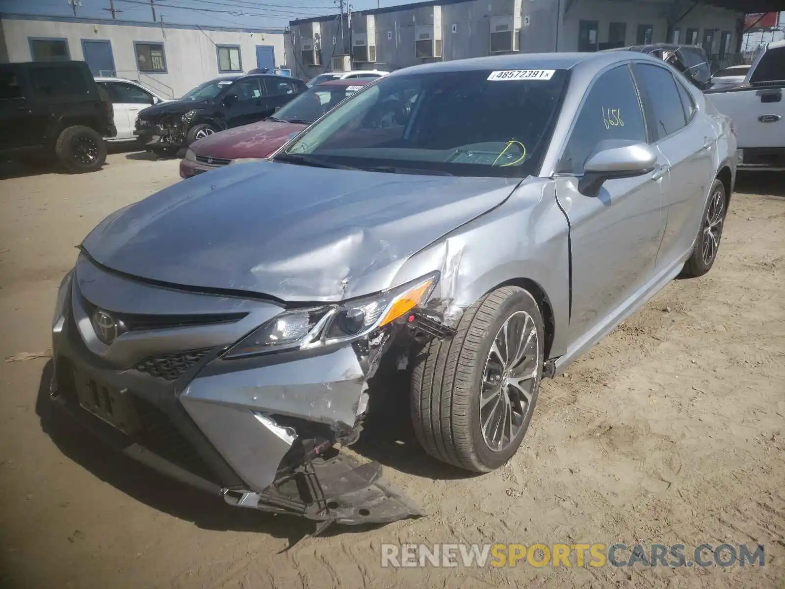 2 Photograph of a damaged car 4T1B11HK1KU715507 TOYOTA CAMRY 2019