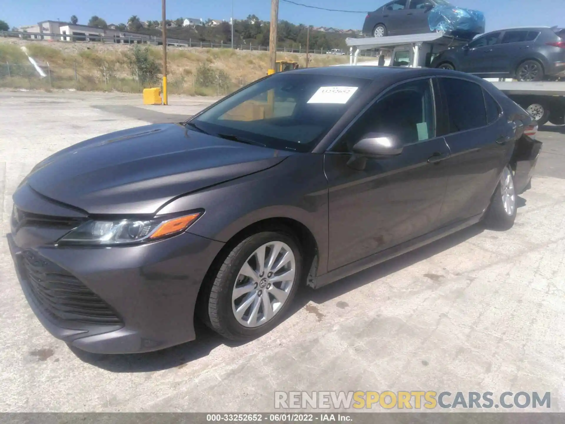 2 Photograph of a damaged car 4T1B11HK1KU717323 TOYOTA CAMRY 2019