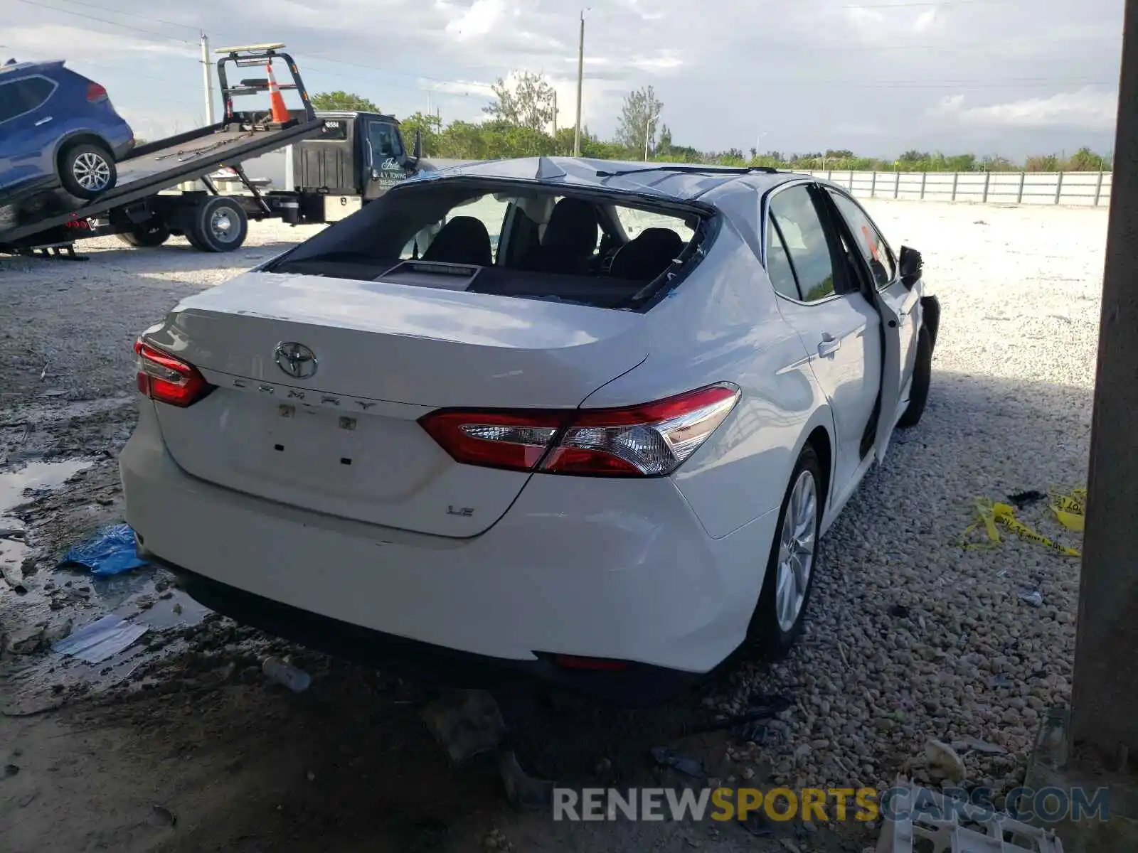 4 Photograph of a damaged car 4T1B11HK1KU718049 TOYOTA CAMRY 2019