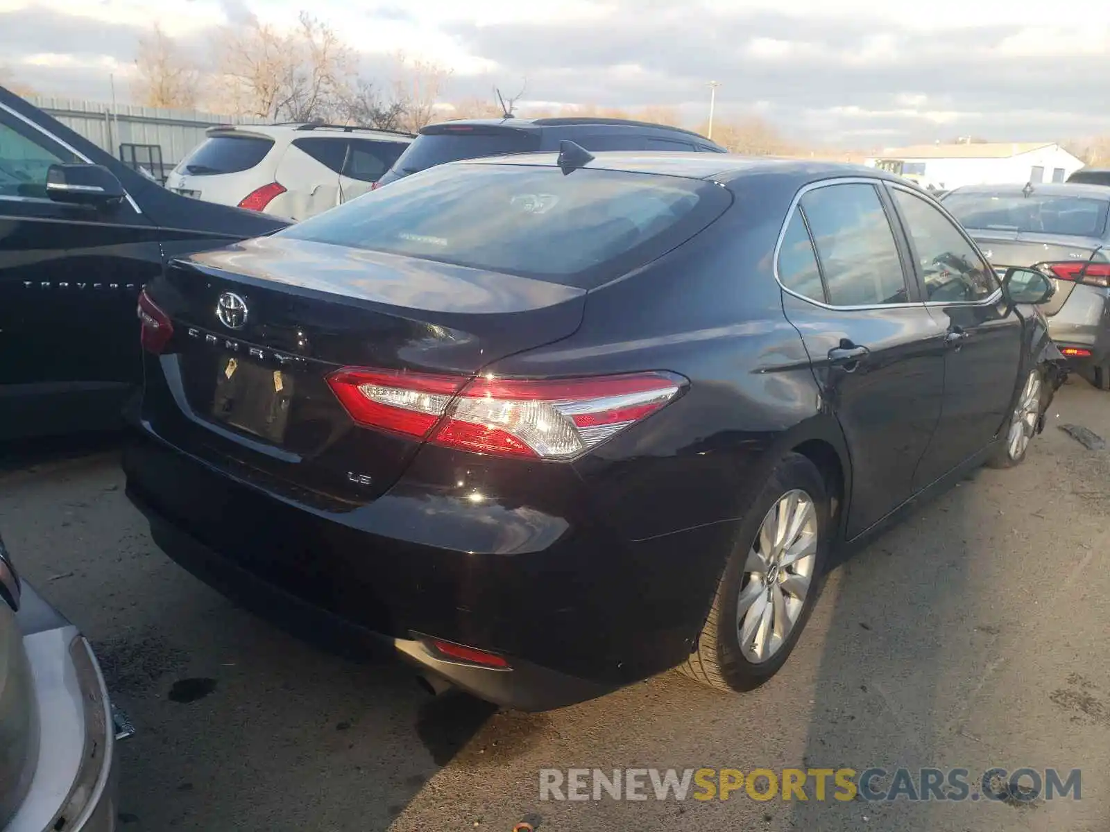 4 Photograph of a damaged car 4T1B11HK1KU718584 TOYOTA CAMRY 2019