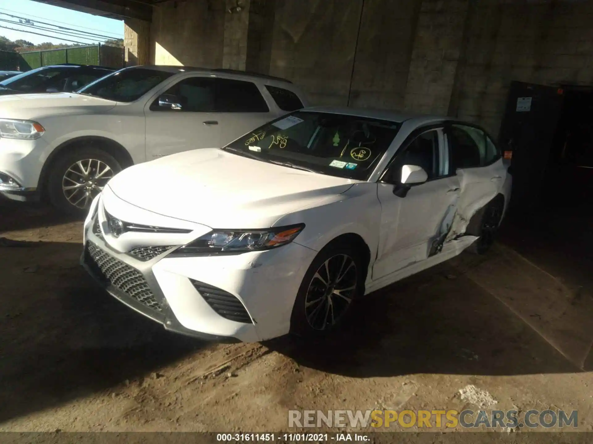 2 Photograph of a damaged car 4T1B11HK1KU719976 TOYOTA CAMRY 2019