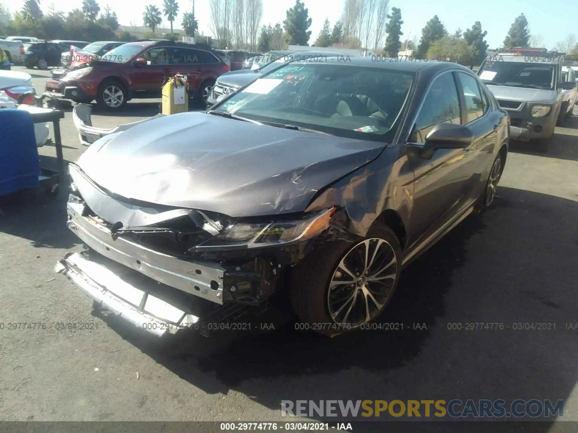 2 Photograph of a damaged car 4T1B11HK1KU720495 TOYOTA CAMRY 2019