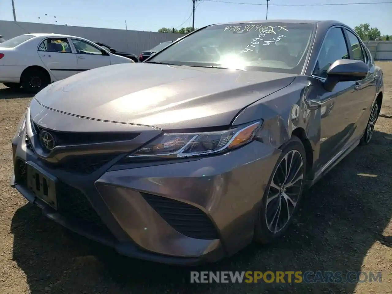 2 Photograph of a damaged car 4T1B11HK1KU723204 TOYOTA CAMRY 2019