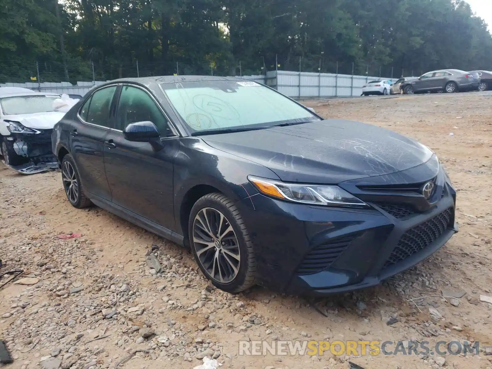 1 Photograph of a damaged car 4T1B11HK1KU723249 TOYOTA CAMRY 2019