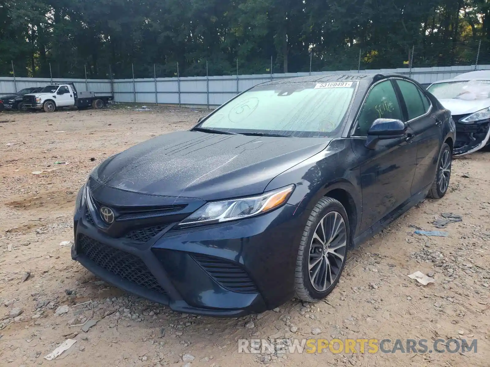 2 Photograph of a damaged car 4T1B11HK1KU723249 TOYOTA CAMRY 2019