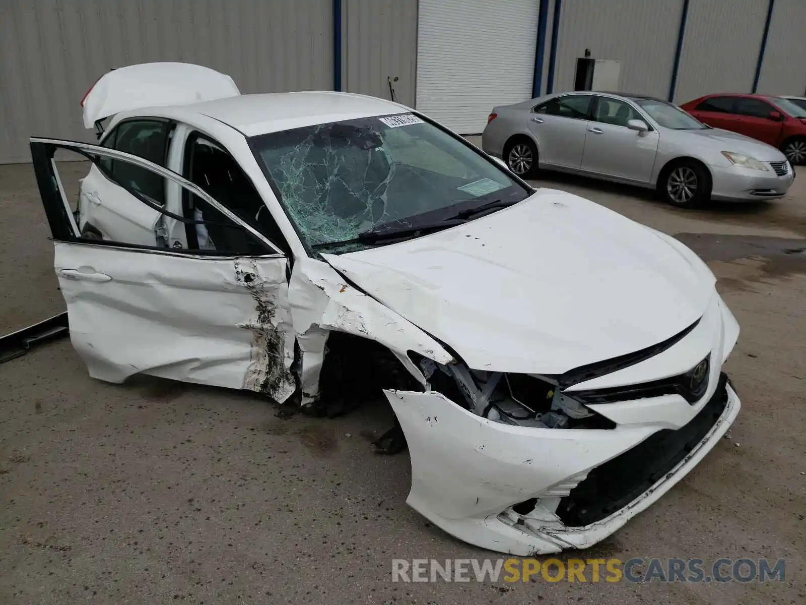 1 Photograph of a damaged car 4T1B11HK1KU723414 TOYOTA CAMRY 2019