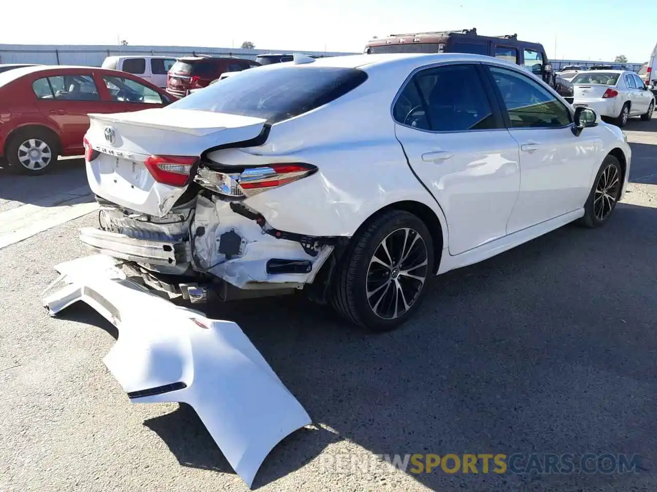 4 Photograph of a damaged car 4T1B11HK1KU724479 TOYOTA CAMRY 2019