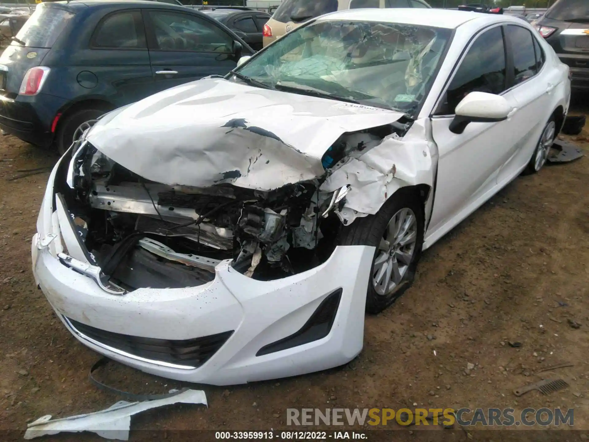 2 Photograph of a damaged car 4T1B11HK1KU724594 TOYOTA CAMRY 2019