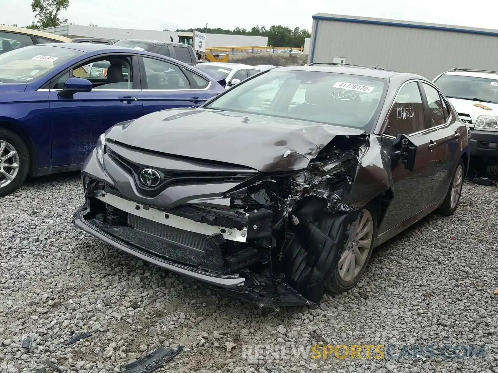 2 Photograph of a damaged car 4T1B11HK1KU724790 TOYOTA CAMRY 2019