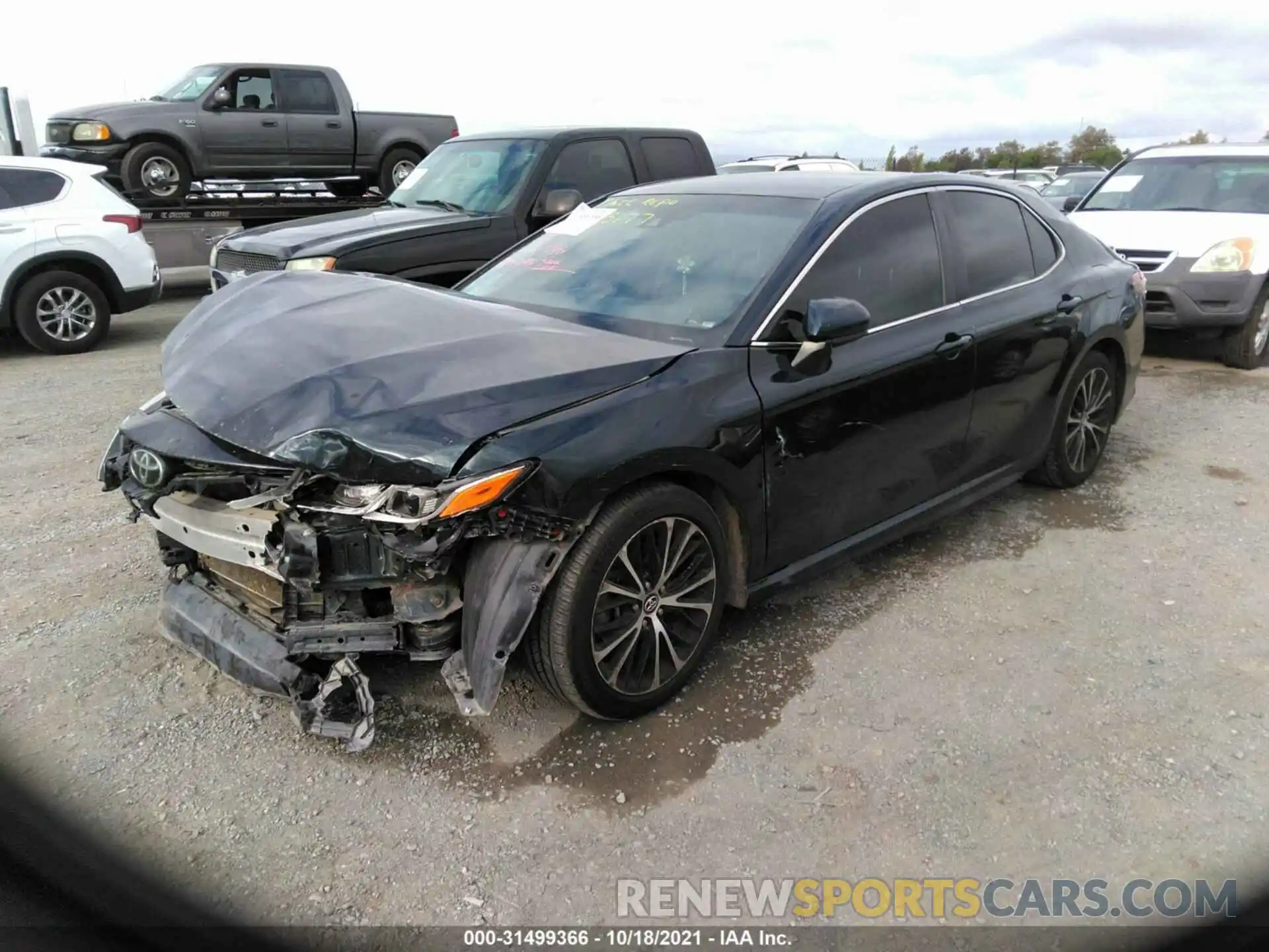 2 Photograph of a damaged car 4T1B11HK1KU725177 TOYOTA CAMRY 2019