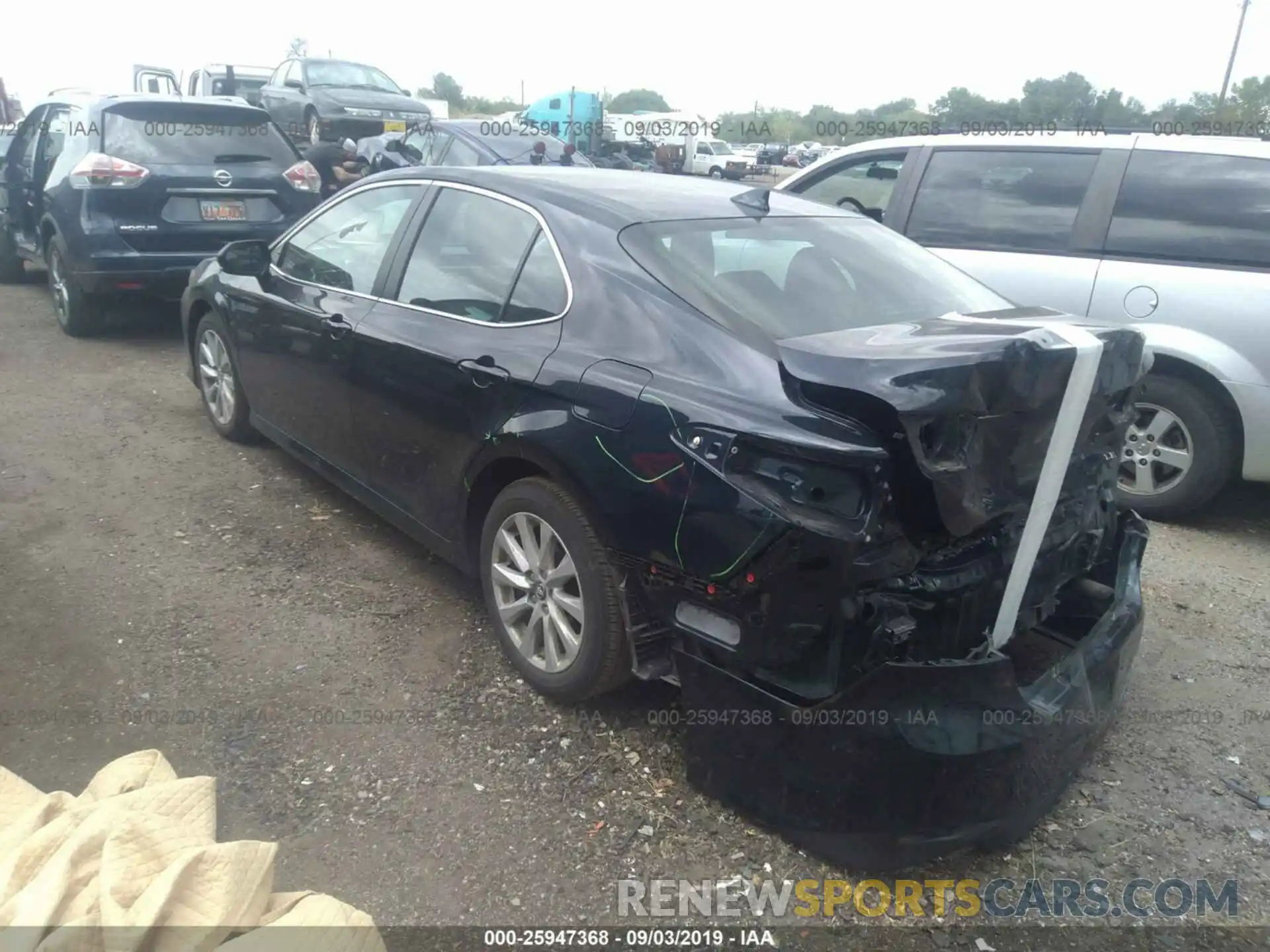 3 Photograph of a damaged car 4T1B11HK1KU727267 TOYOTA CAMRY 2019