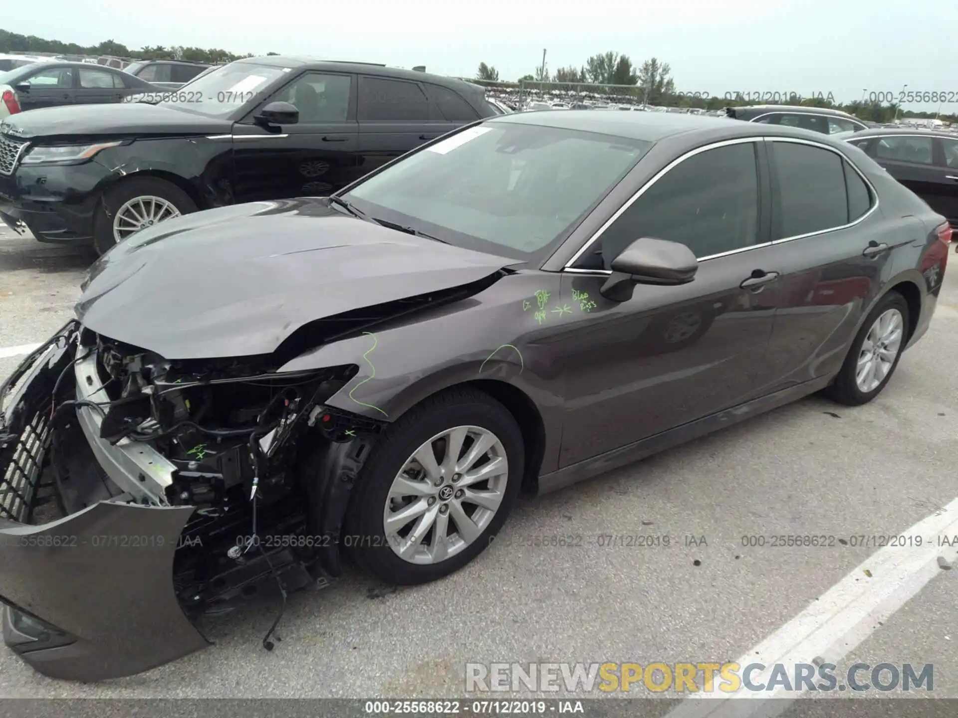 2 Photograph of a damaged car 4T1B11HK1KU727432 TOYOTA CAMRY 2019