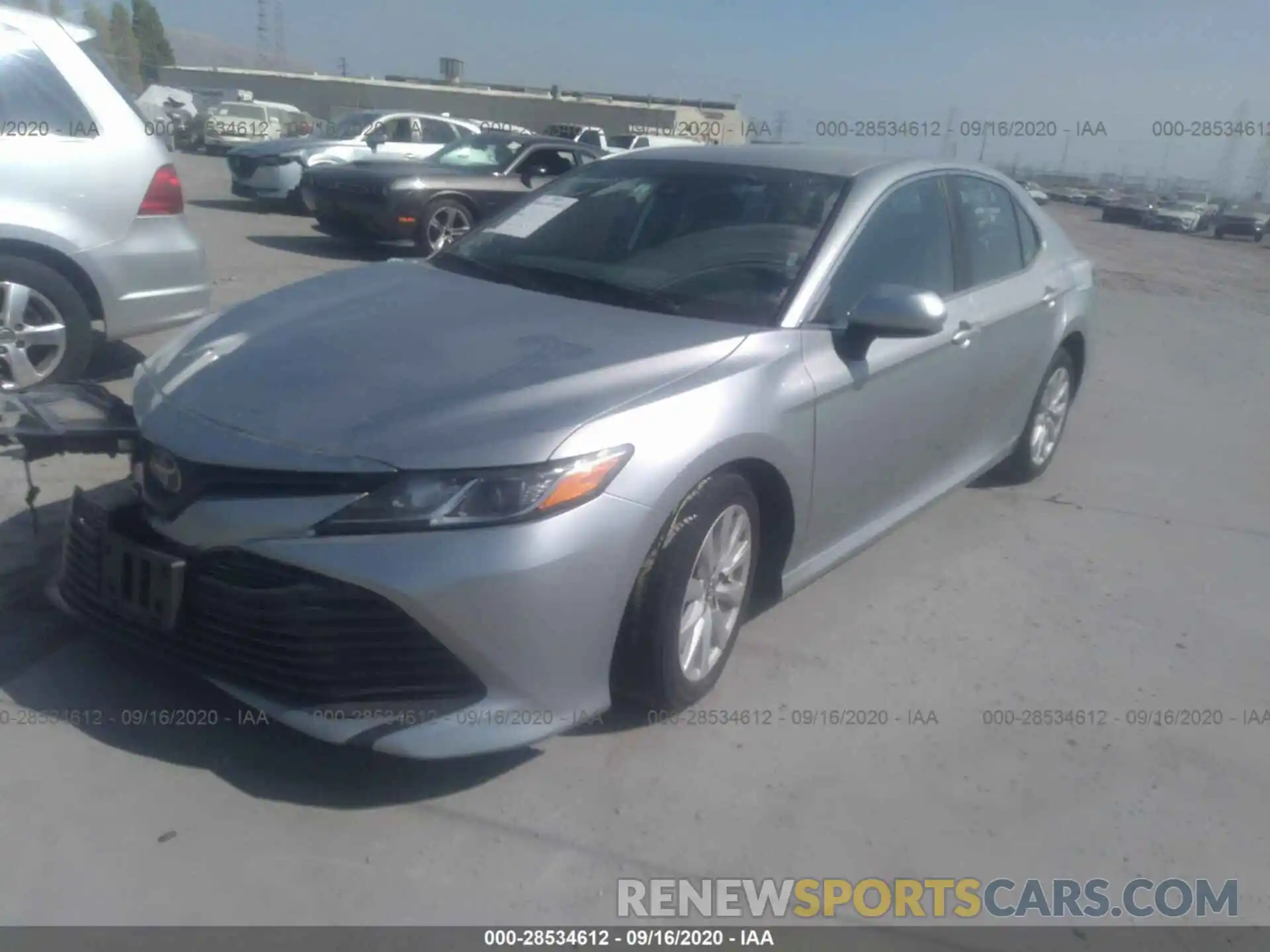 2 Photograph of a damaged car 4T1B11HK1KU730718 TOYOTA CAMRY 2019