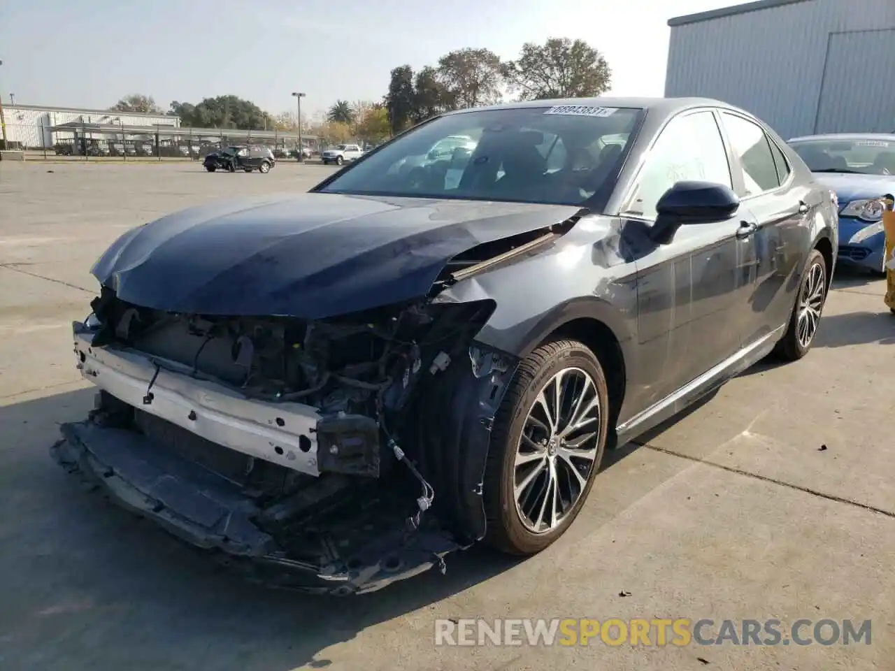 2 Photograph of a damaged car 4T1B11HK1KU731724 TOYOTA CAMRY 2019