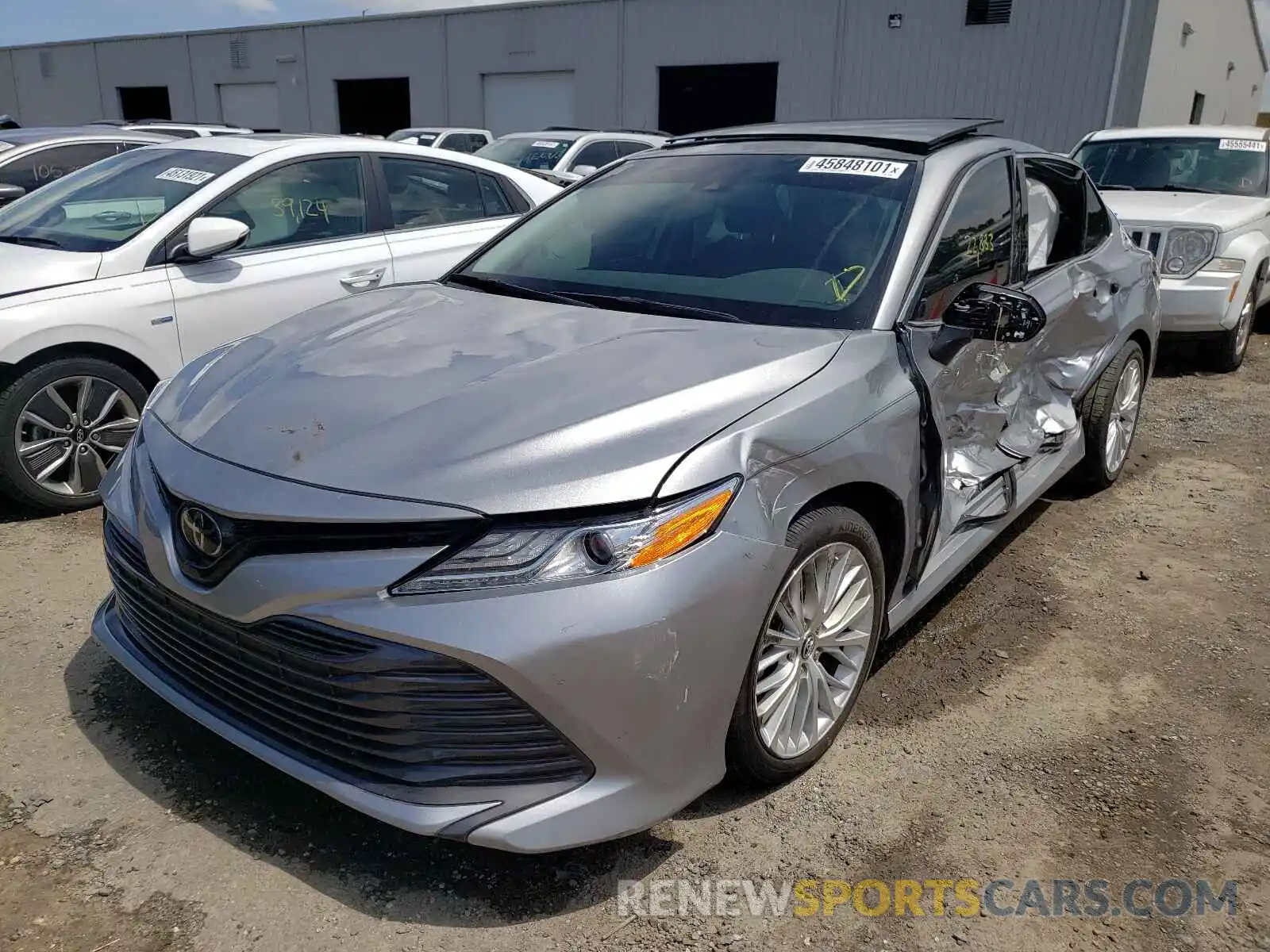 2 Photograph of a damaged car 4T1B11HK1KU733554 TOYOTA CAMRY 2019