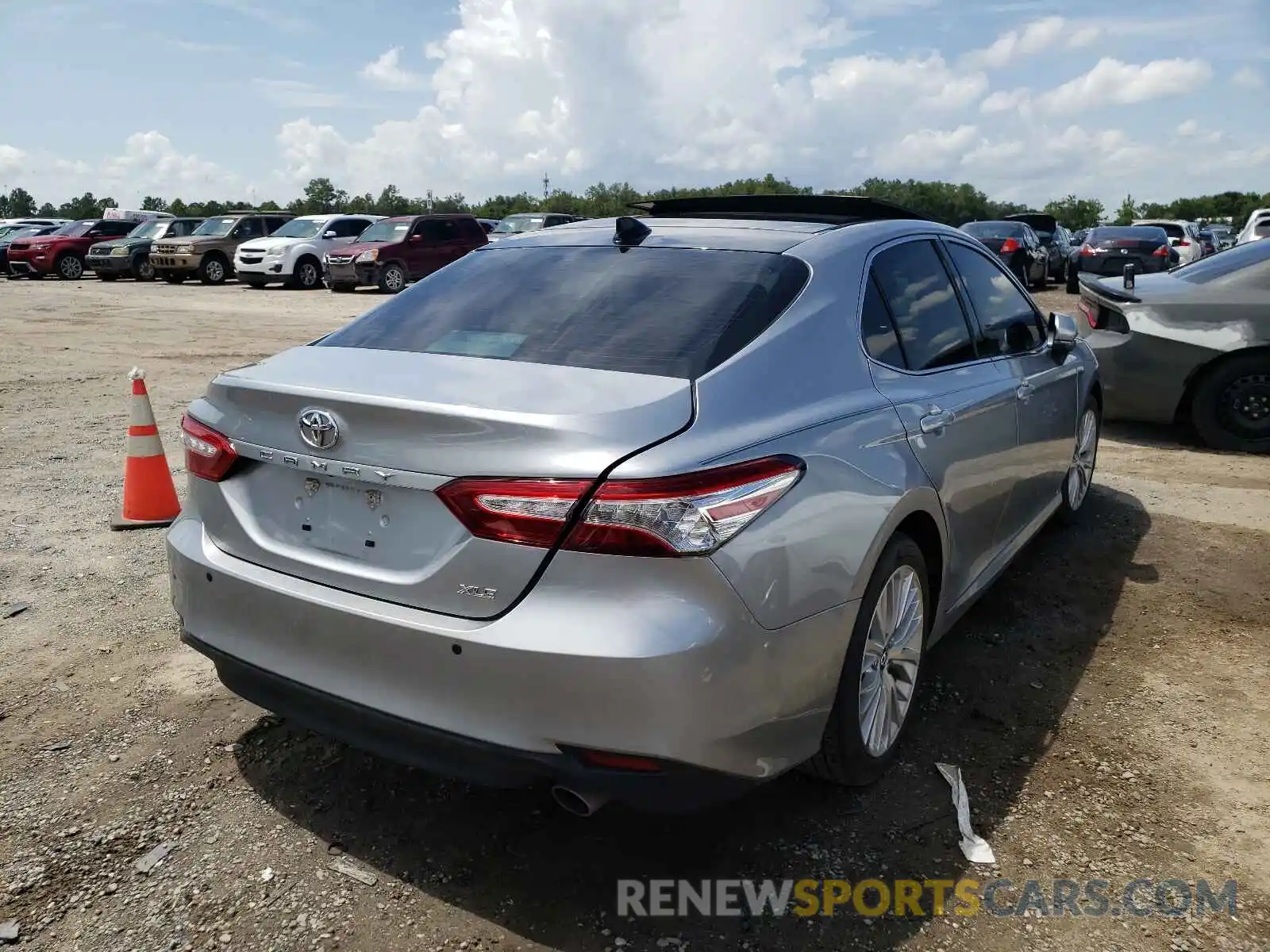 4 Photograph of a damaged car 4T1B11HK1KU733554 TOYOTA CAMRY 2019